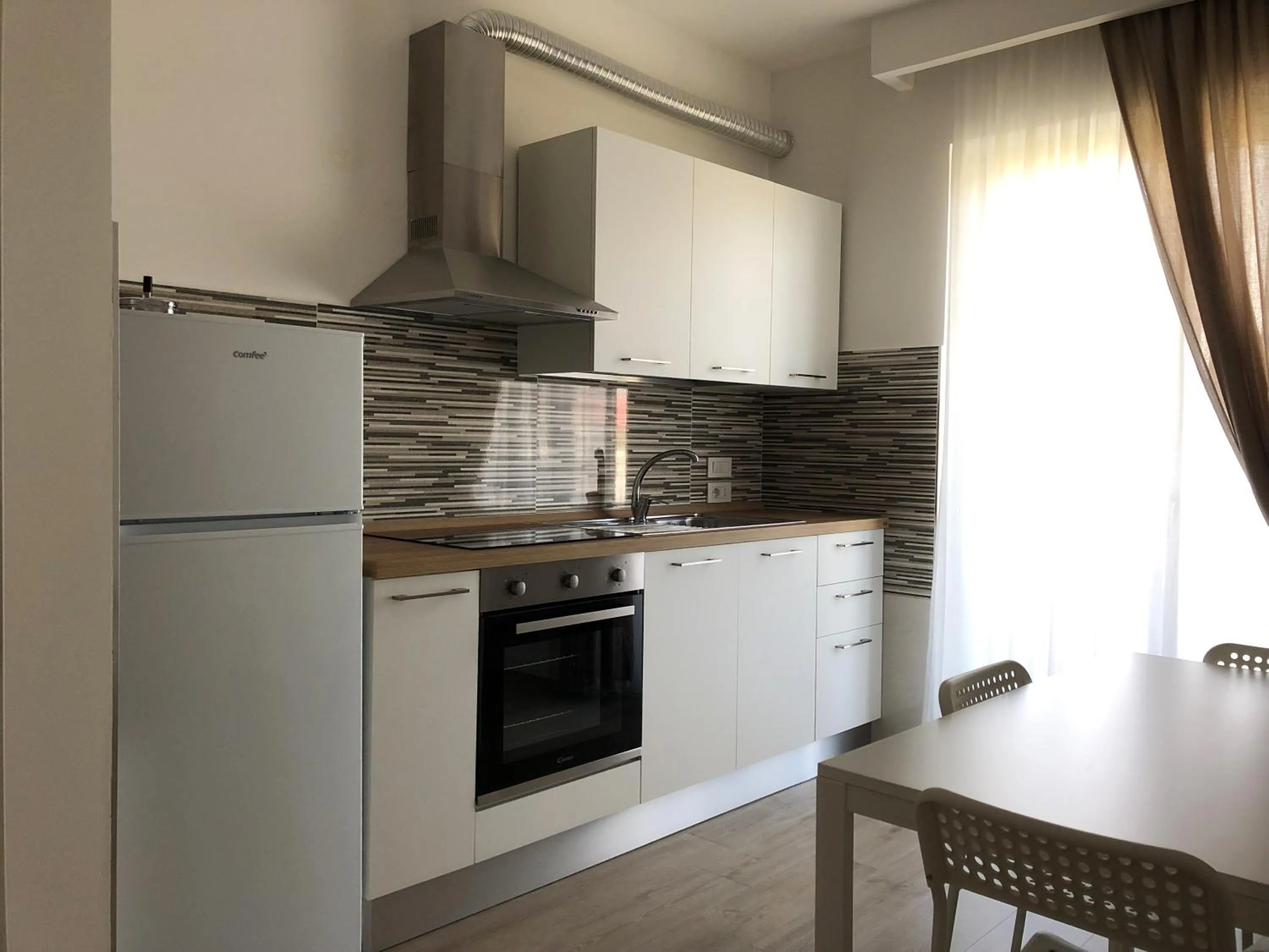 Accòmodati - Camere e Appartamenti