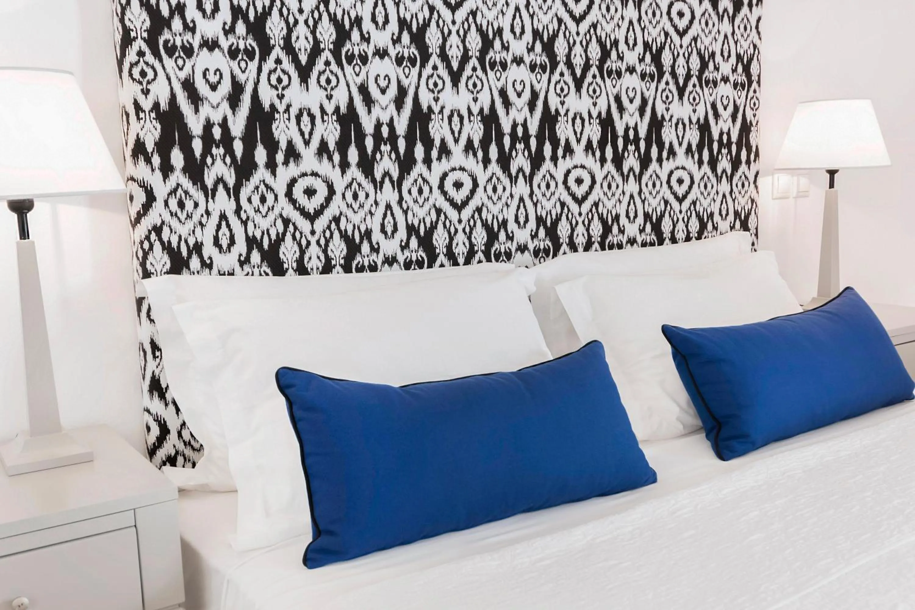 Bed in Stelia Mare Boutique Hotel