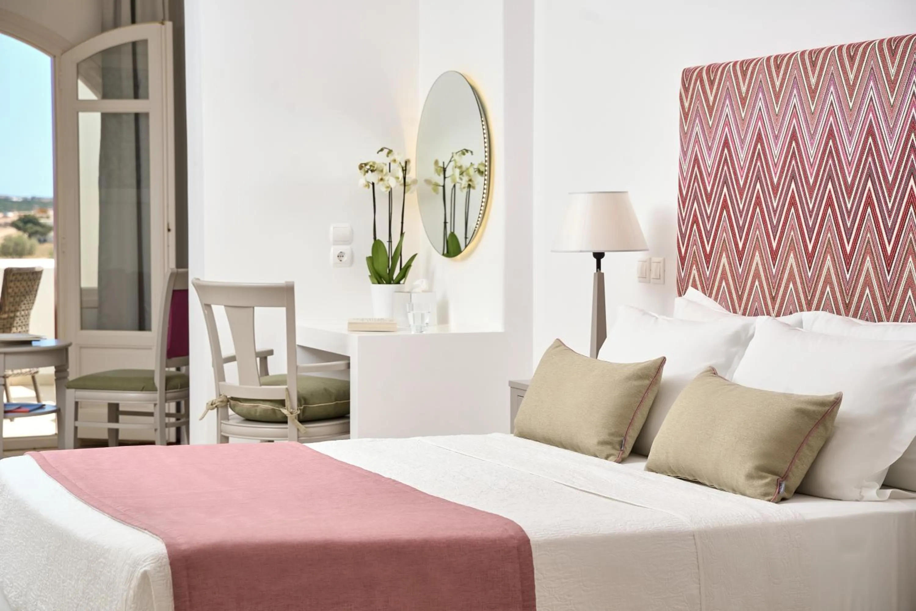 Bed in Stelia Mare Boutique Hotel