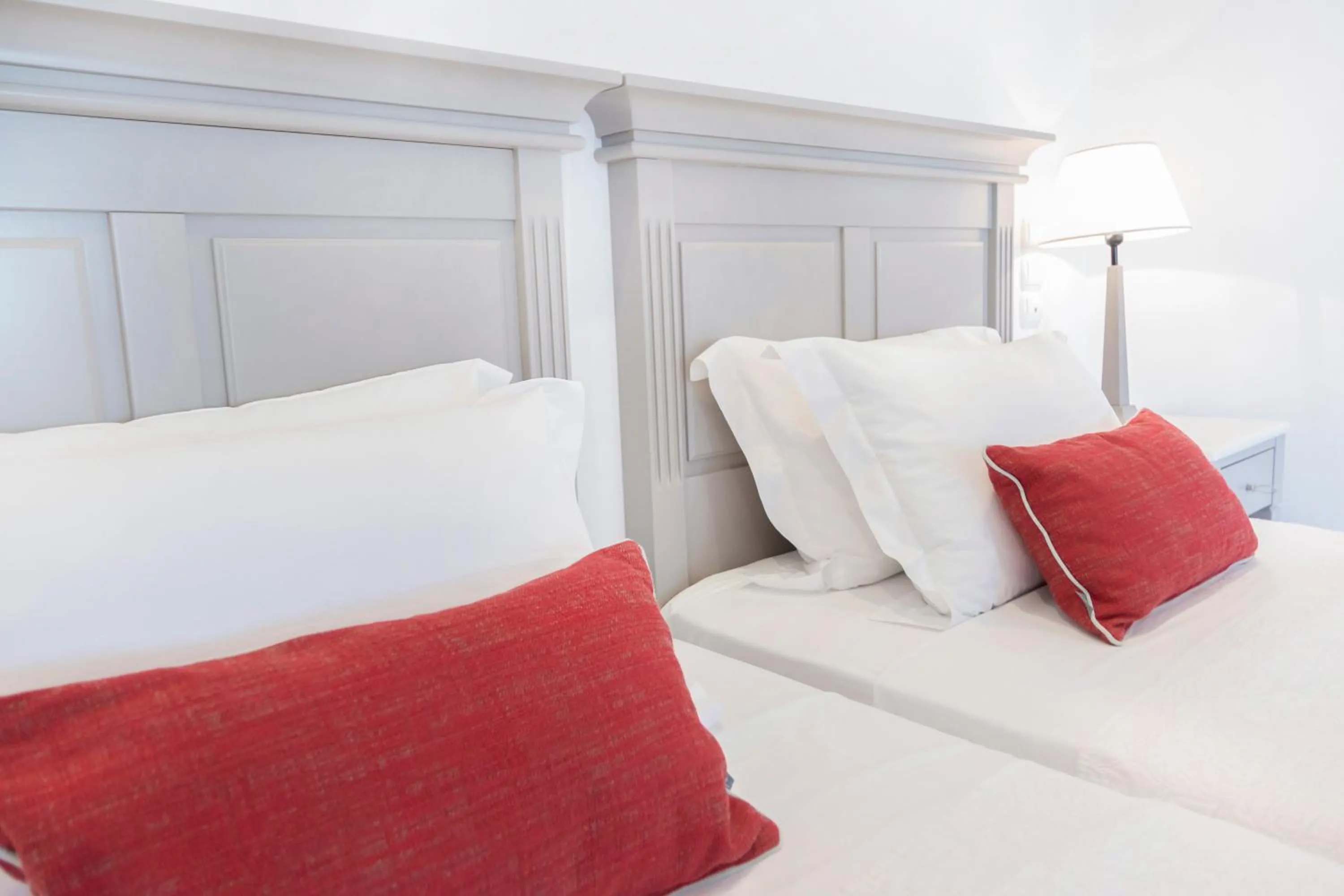 Bed in Stelia Mare Boutique Hotel