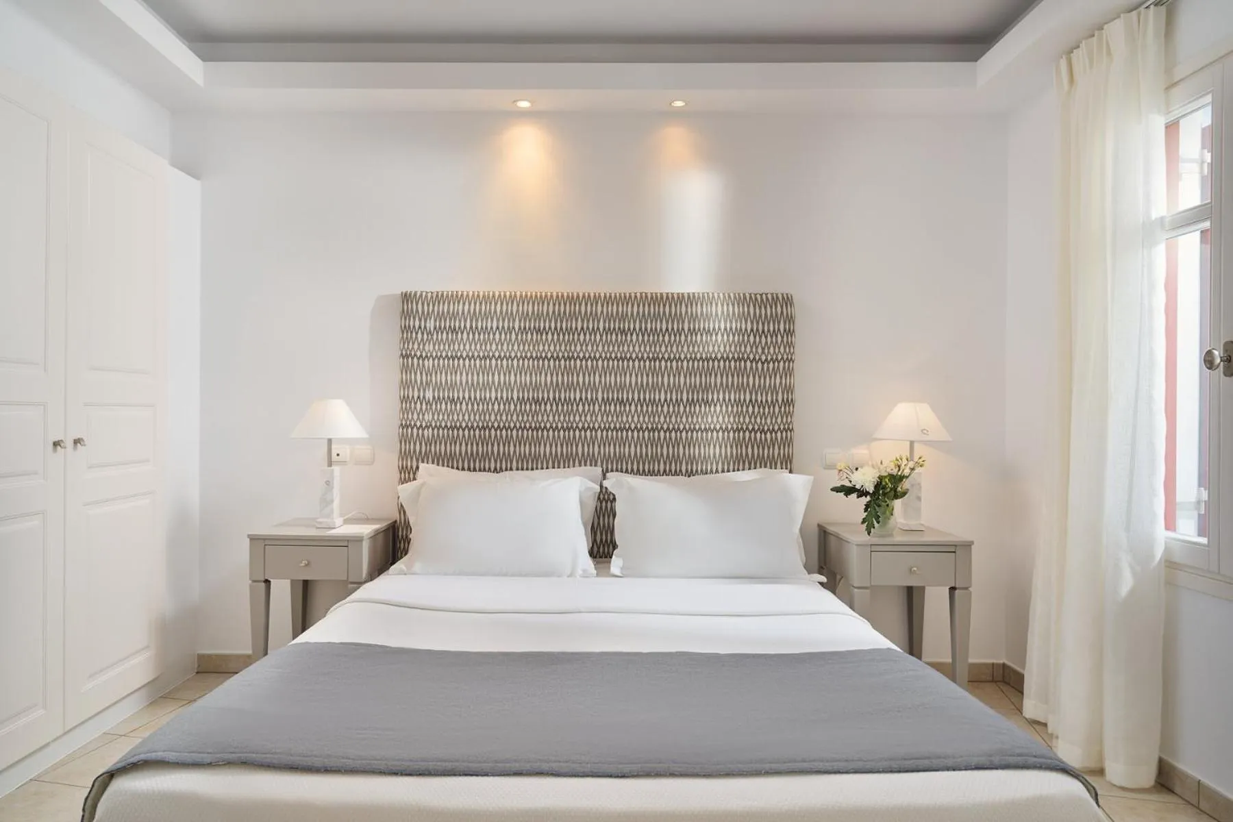 Bed in Stelia Mare Boutique Hotel