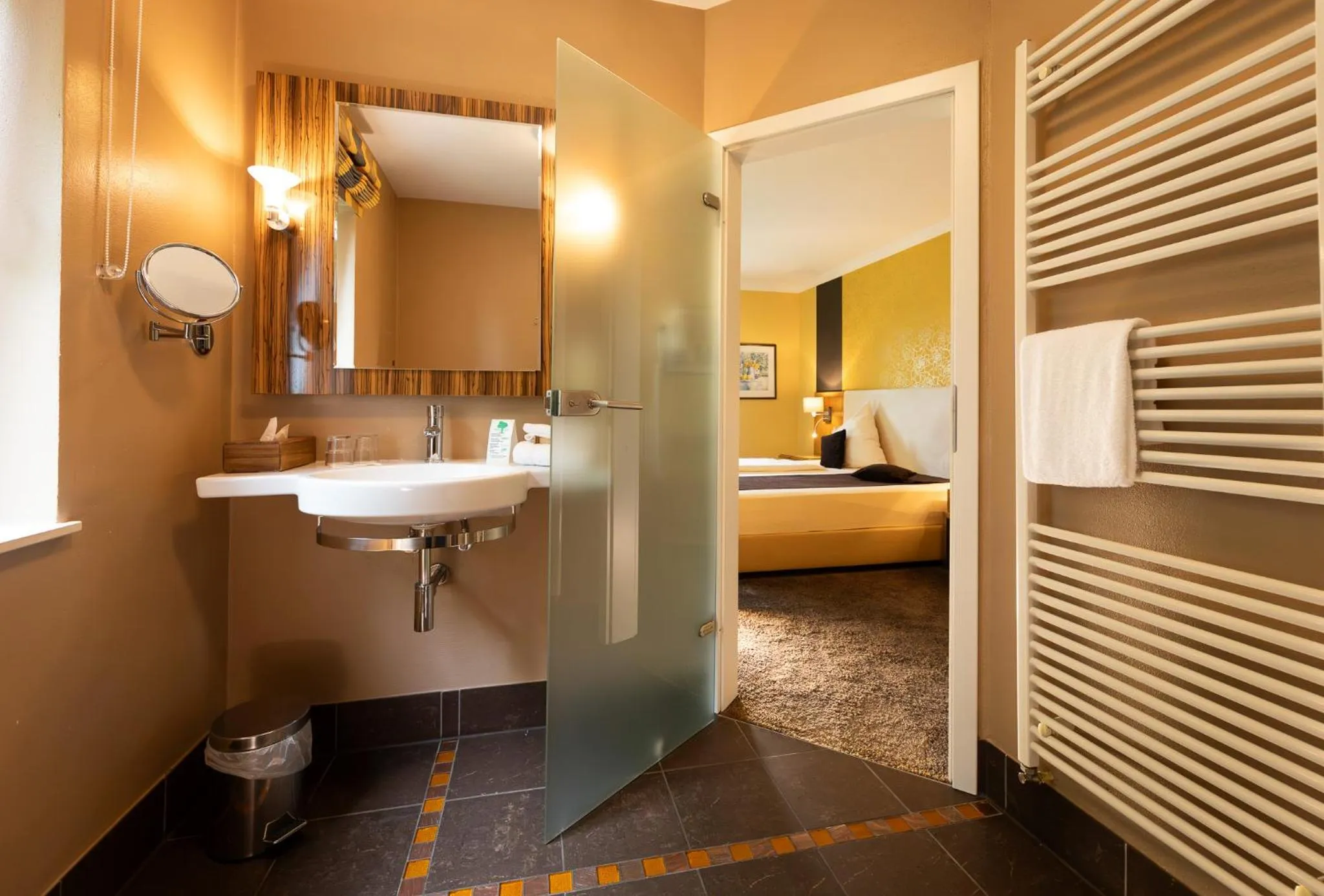 Bathroom, Bed in Hotel Sonnenhof