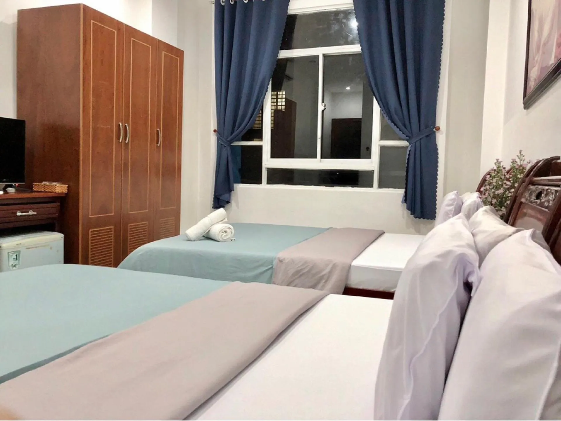 Bed in SaiGon CoZy Hotel "241 Pham Ngu Lao Street''