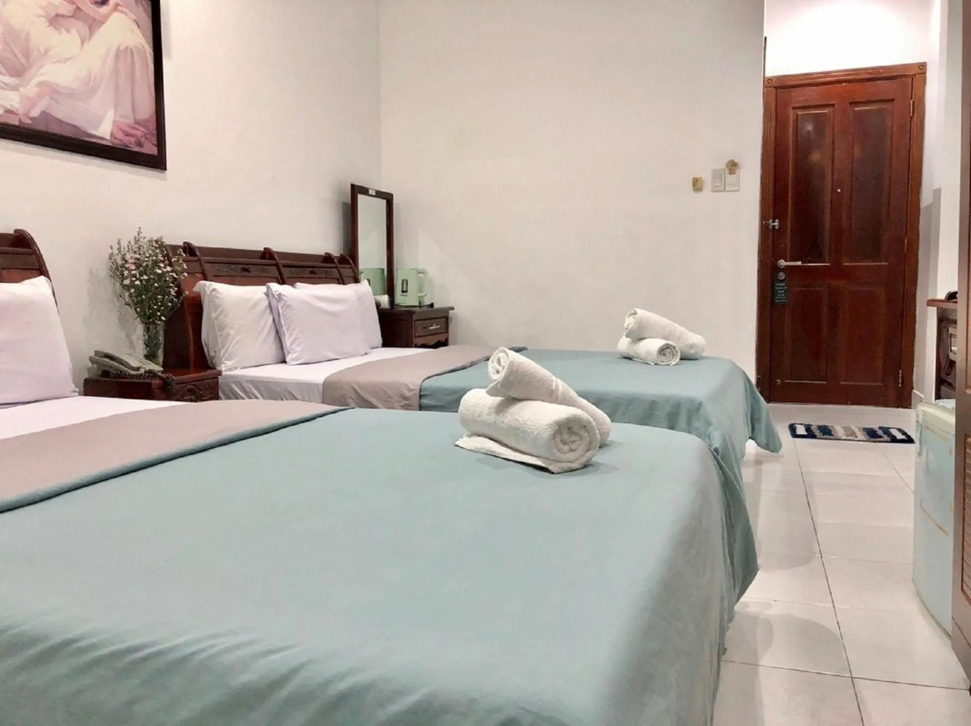 Bed in SaiGon CoZy Hotel "241 Pham Ngu Lao Street''