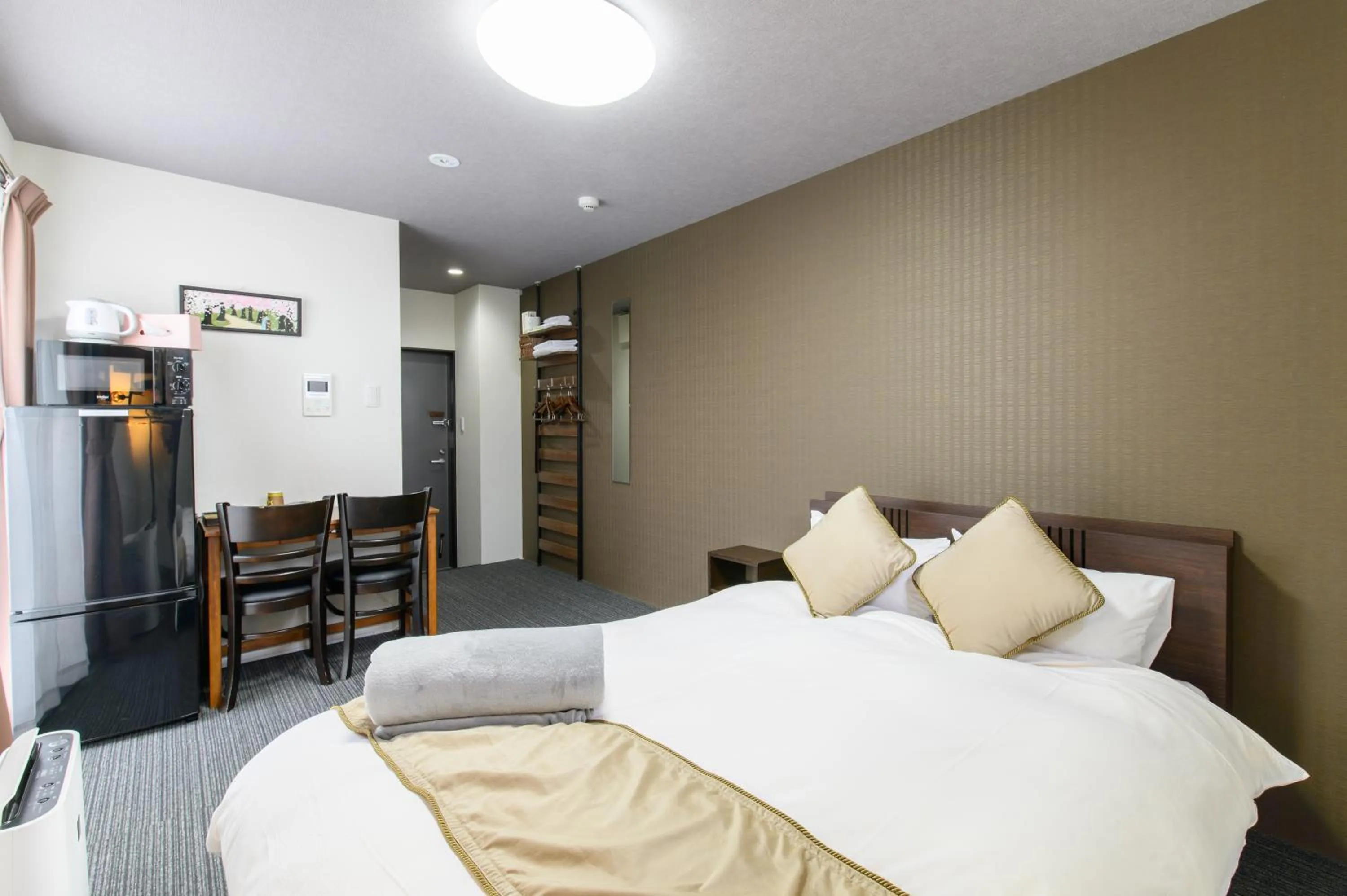 Bed in JP INN Kyotoeki Kita Gakurincho