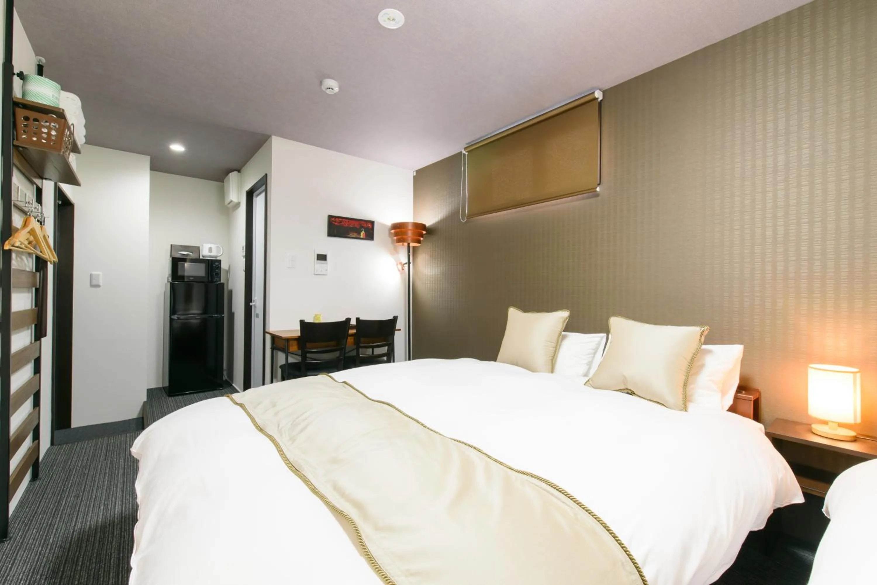 Bed in JP INN Kyotoeki Kita Gakurincho