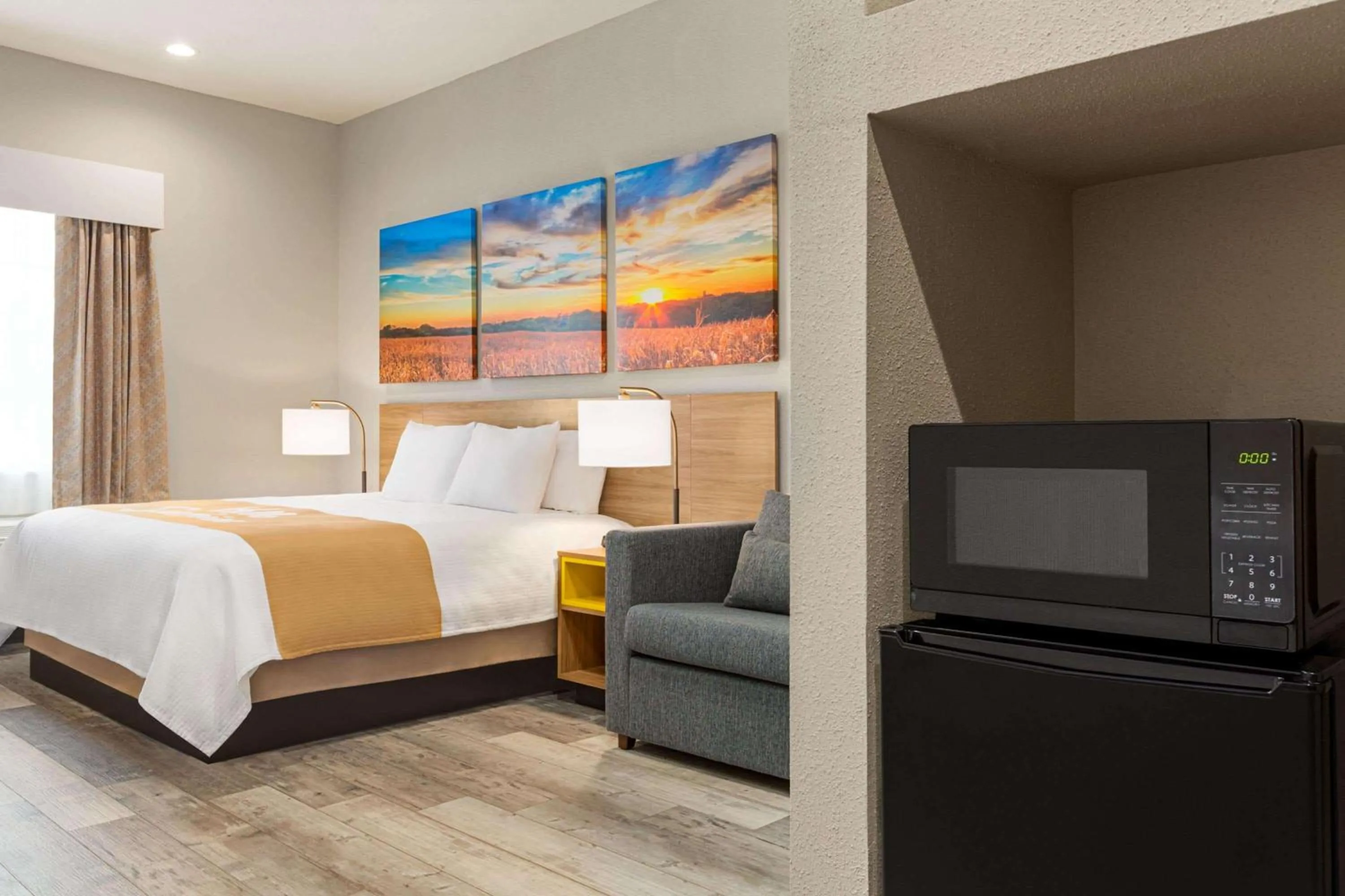Photo of the whole room, Bed in Days Inn & Suites by Wyndham Greater Tomball
