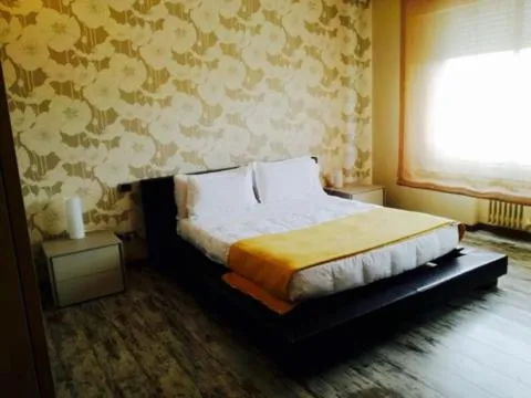 Bedroom, Bed in Venice Terminal Apartments & Suites