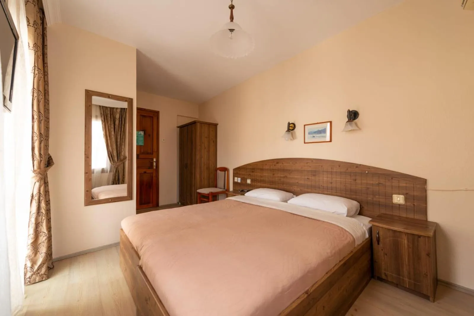 Bed in LİMON OTEL FOÇA