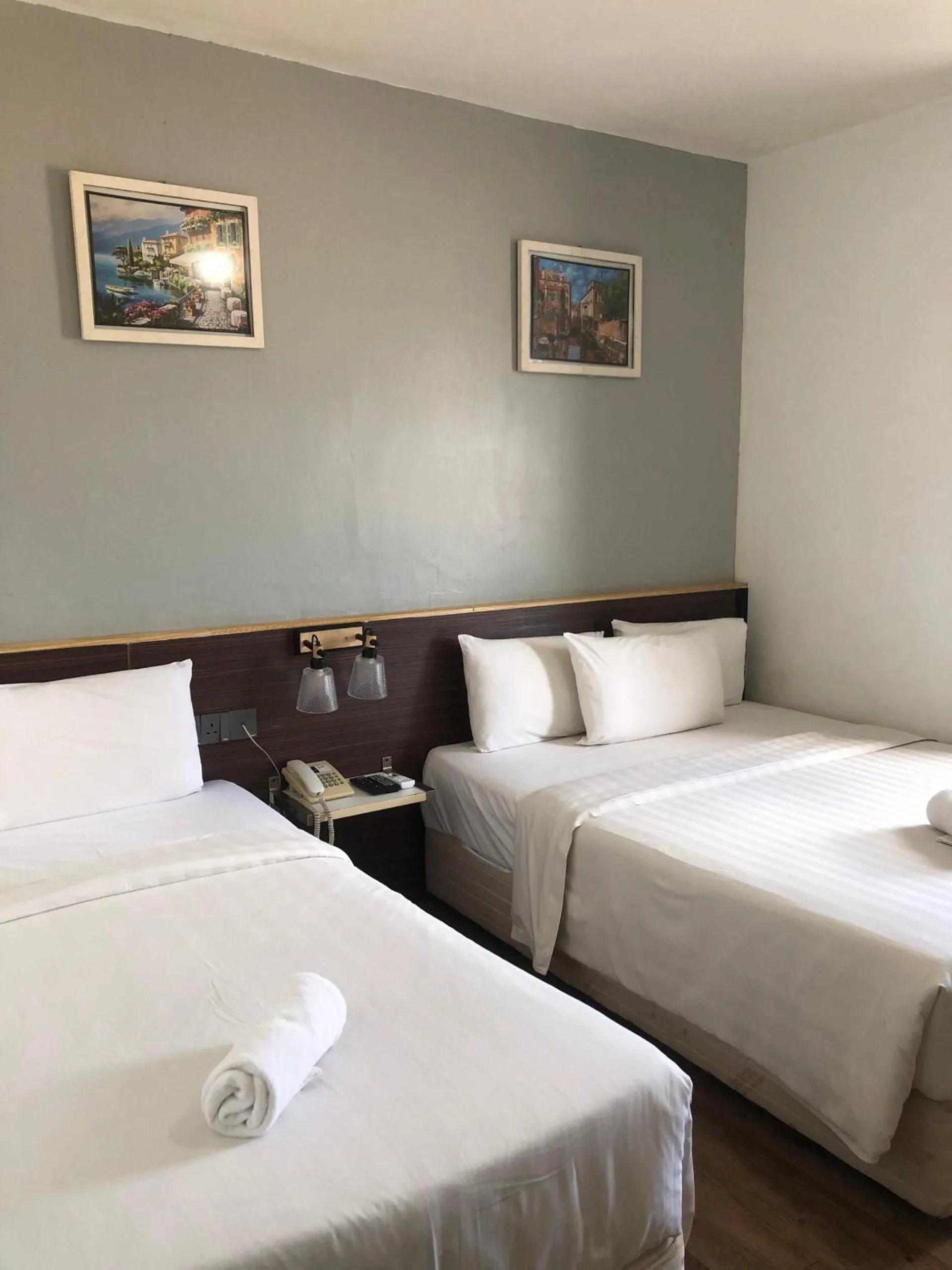 Bed in Ridel Sunset Hotel