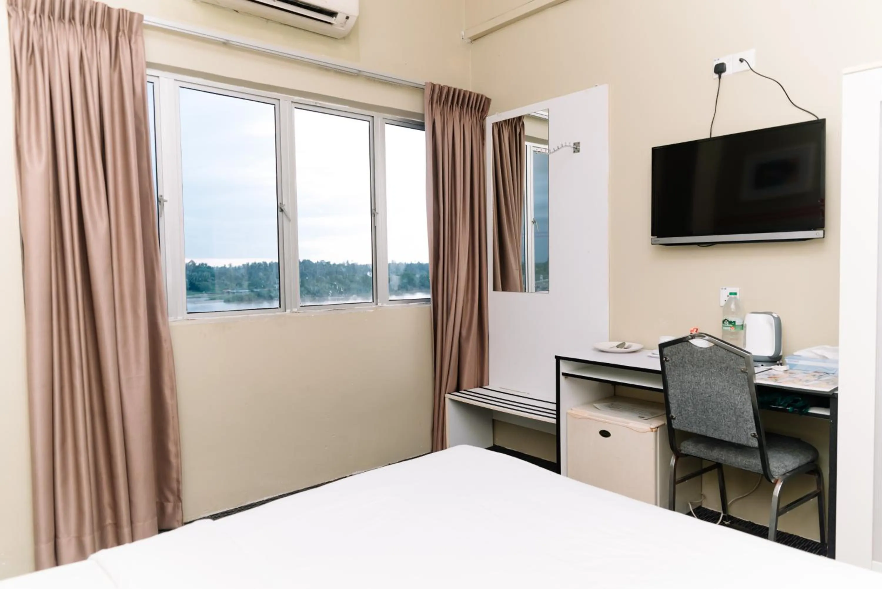 Bed in Ridel Sunset Hotel