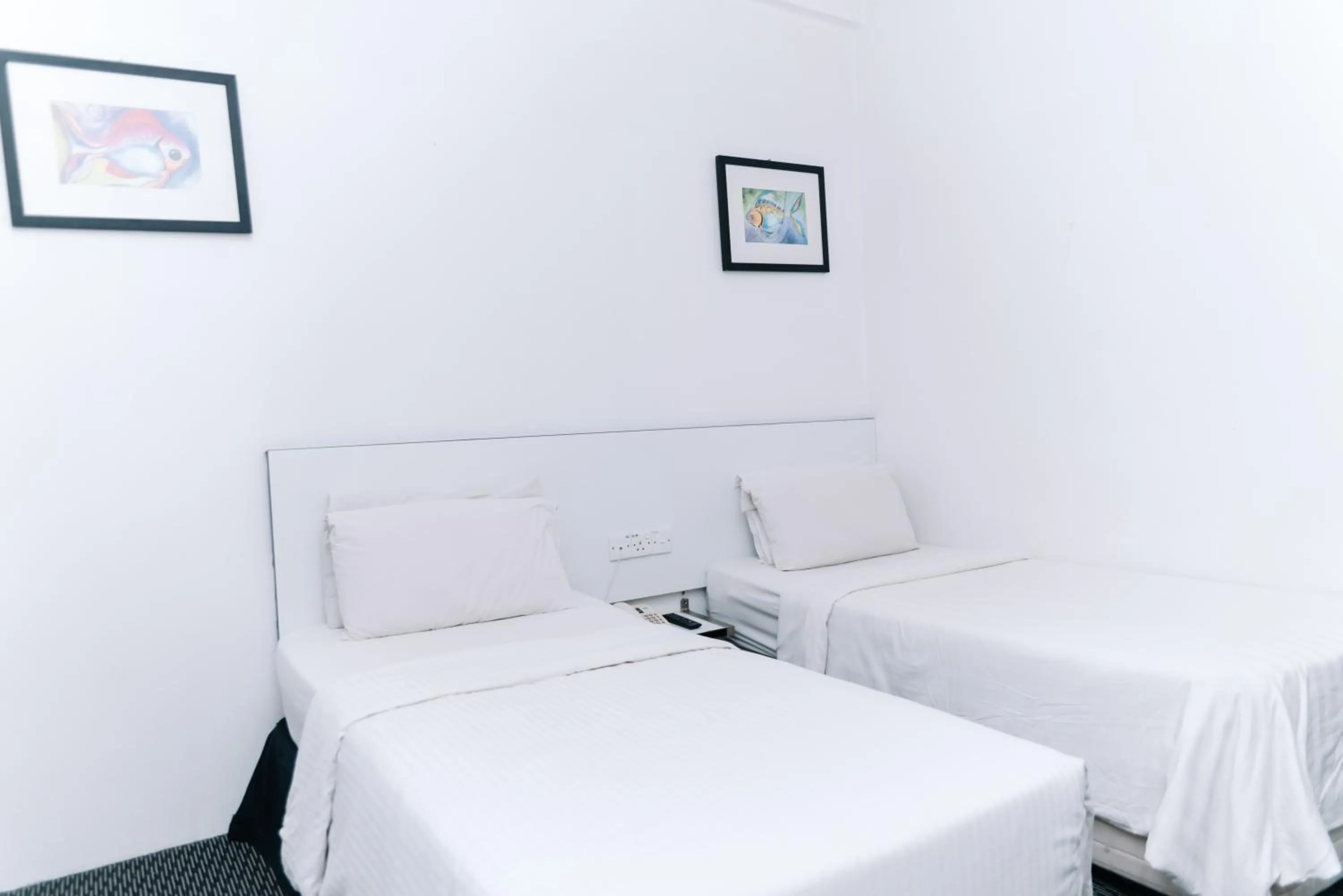 Bed in Ridel Sunset Hotel