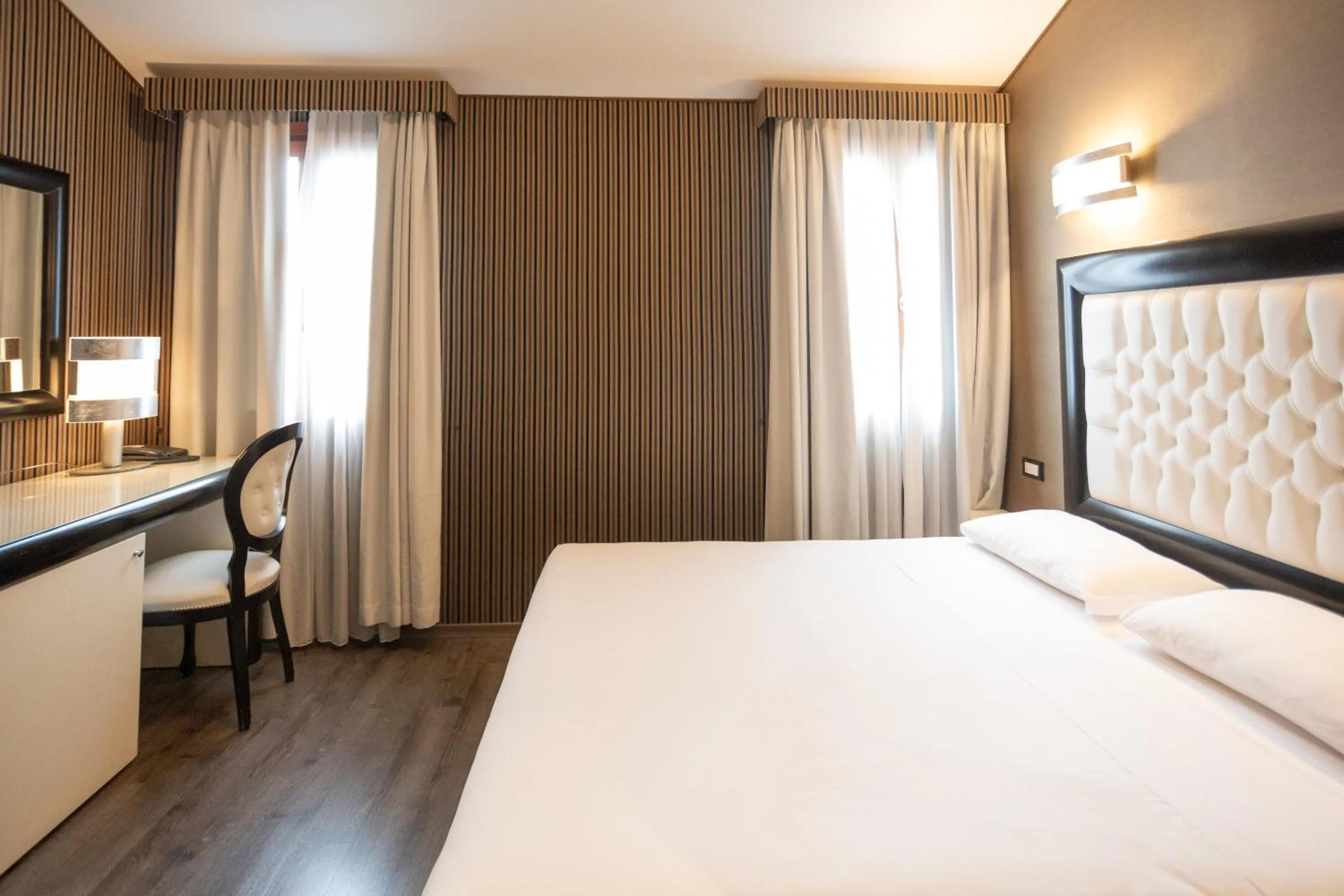 Bed in Duomo Boutique Hotel