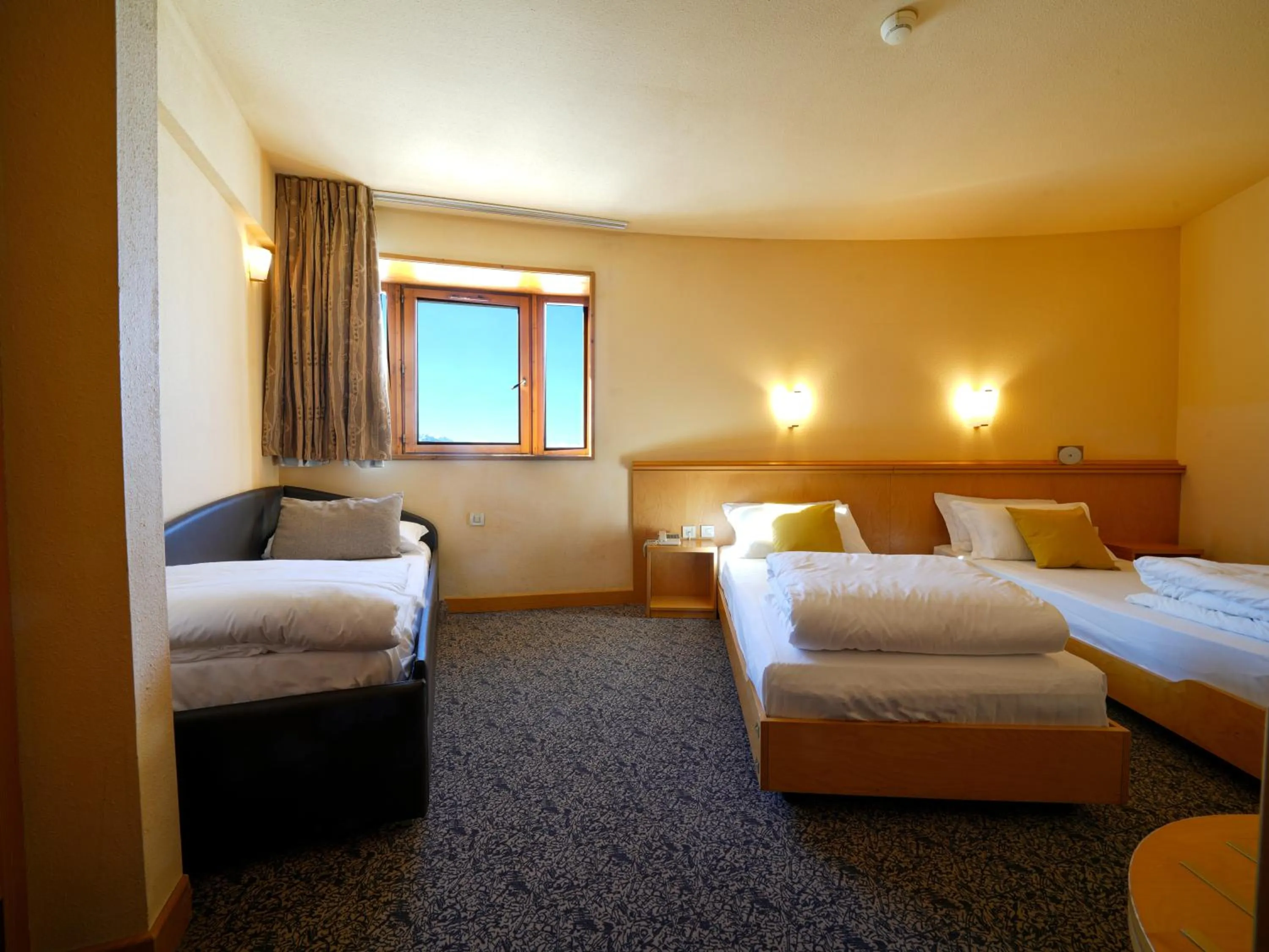 Bed in Hotel Club Uappala Sestriere