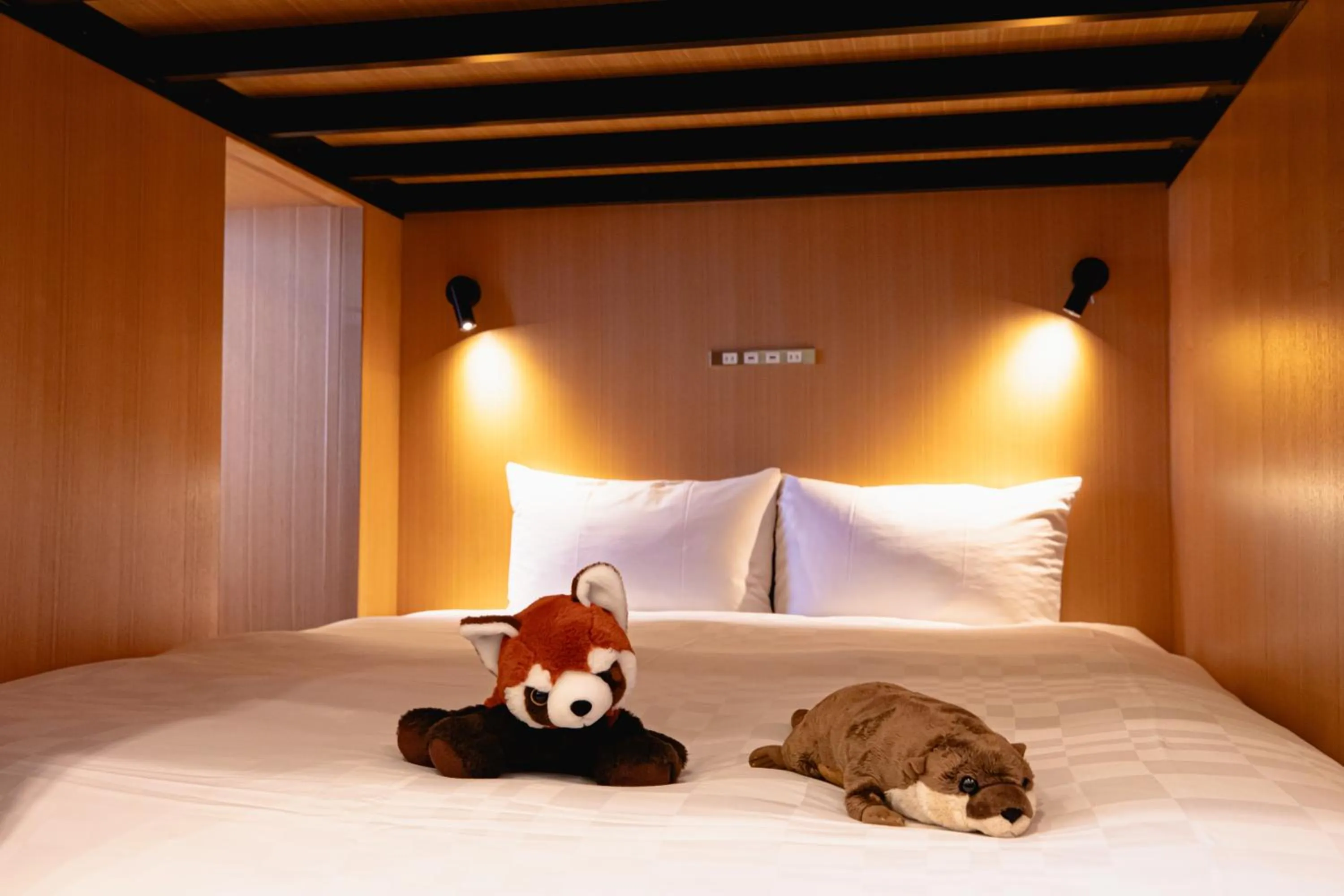 Bed in GOLD STAY Nagoya Osu