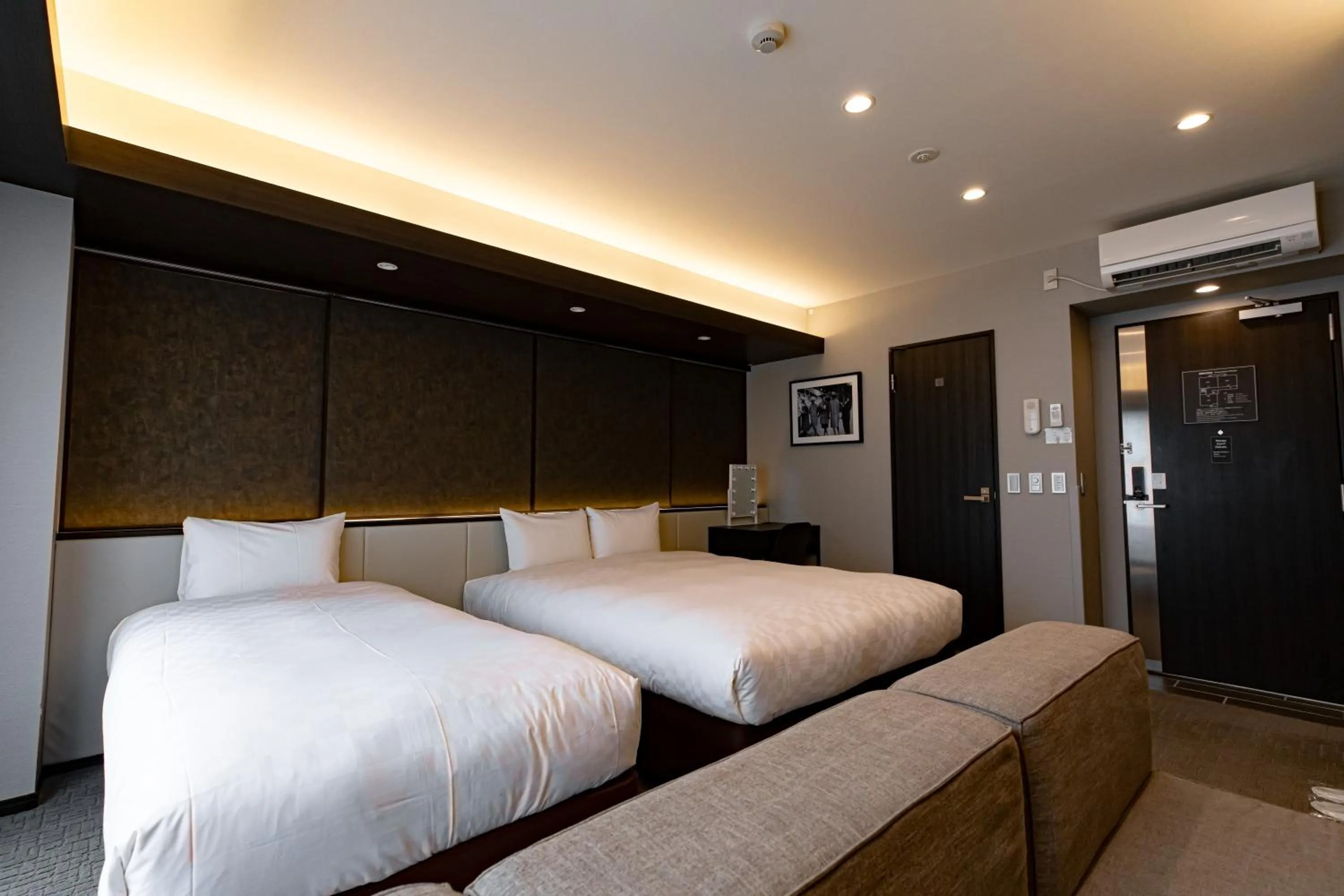 Bed in GOLD STAY Nagoya Osu