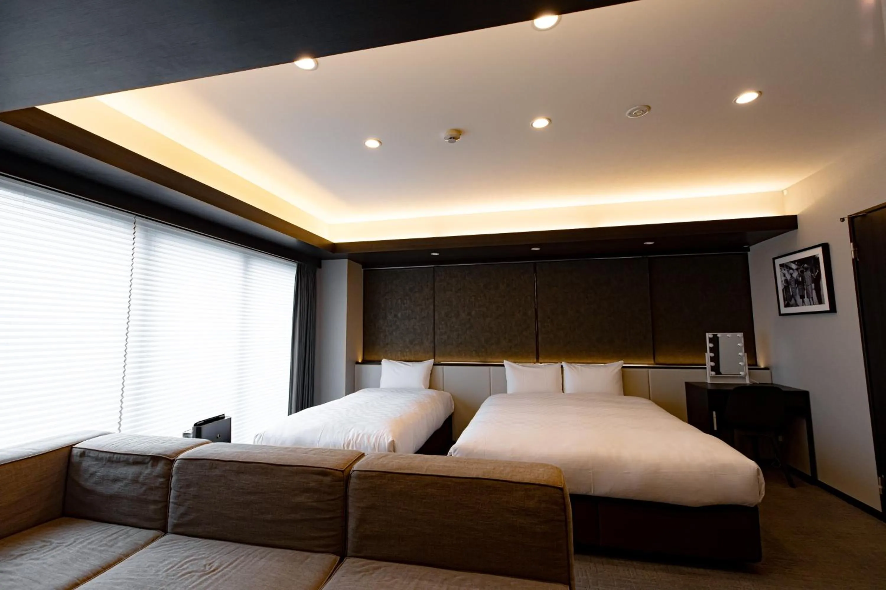 Bed in GOLD STAY Nagoya Osu