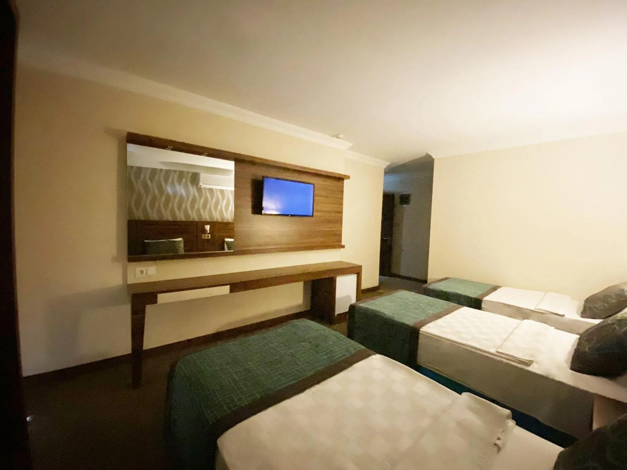 Bed in Emily Rose Hotel