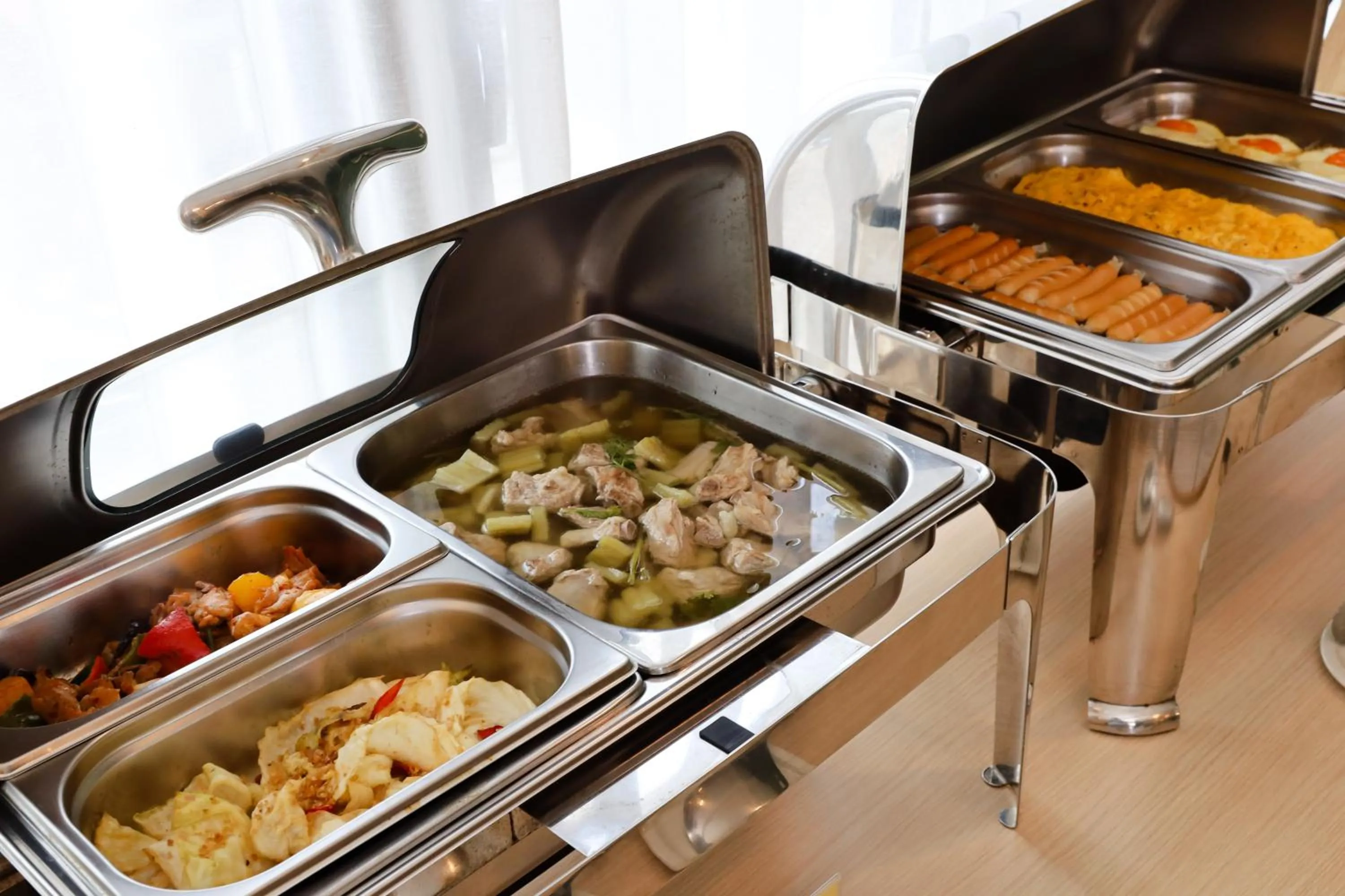 Buffet breakfast in The Rise Suites Hotel, Chiang Mai - SHA Extra Plus