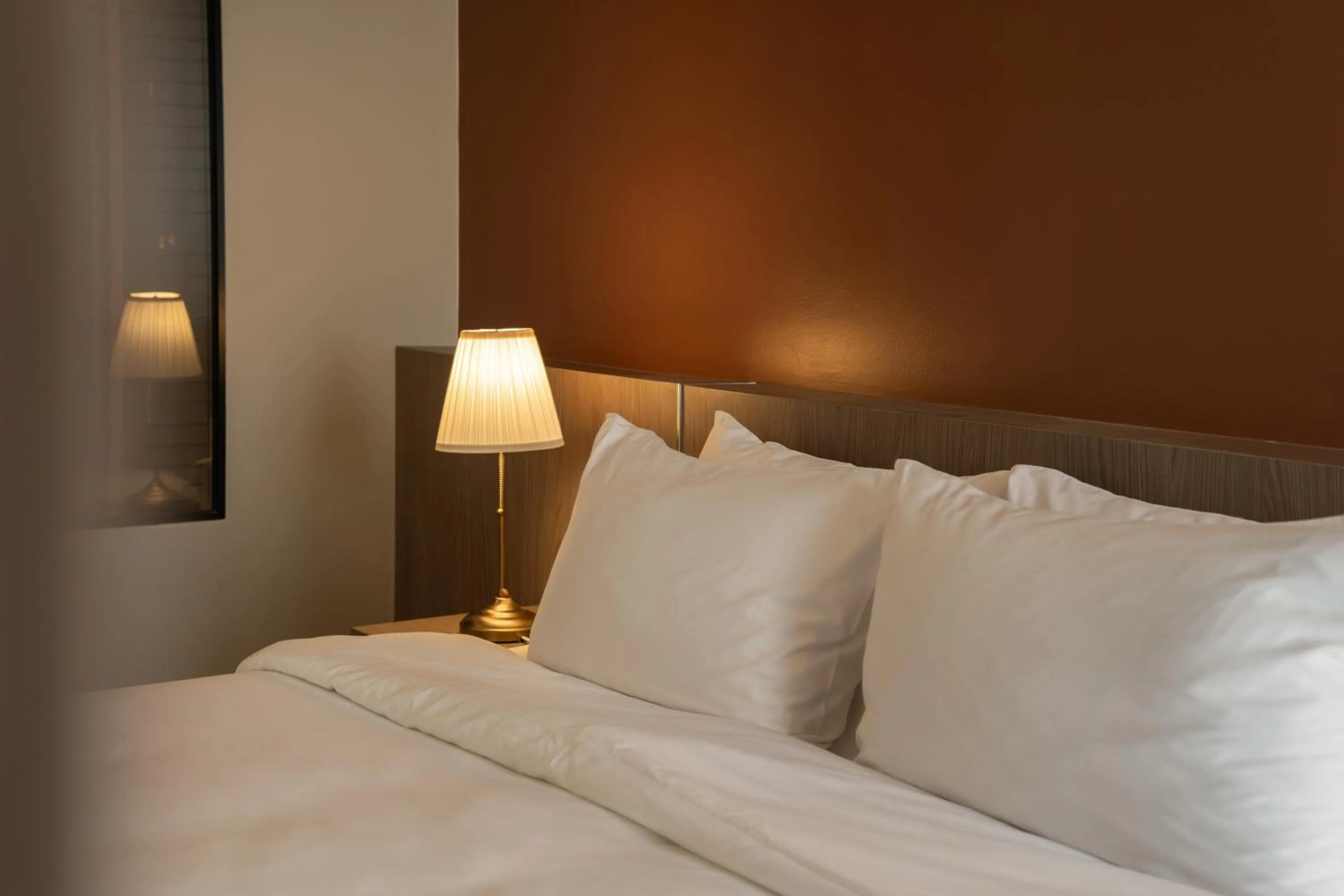 Bed in The Rise Suites Hotel, Chiang Mai - SHA Extra Plus