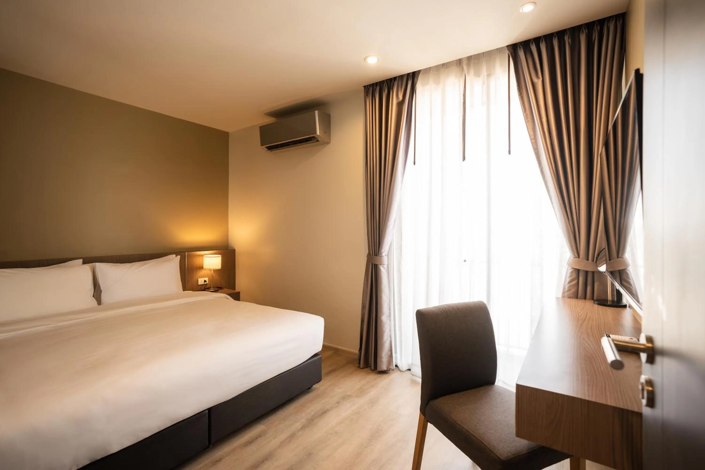 Bedroom, Bed in The Rise Suites Hotel, Chiang Mai - SHA Extra Plus