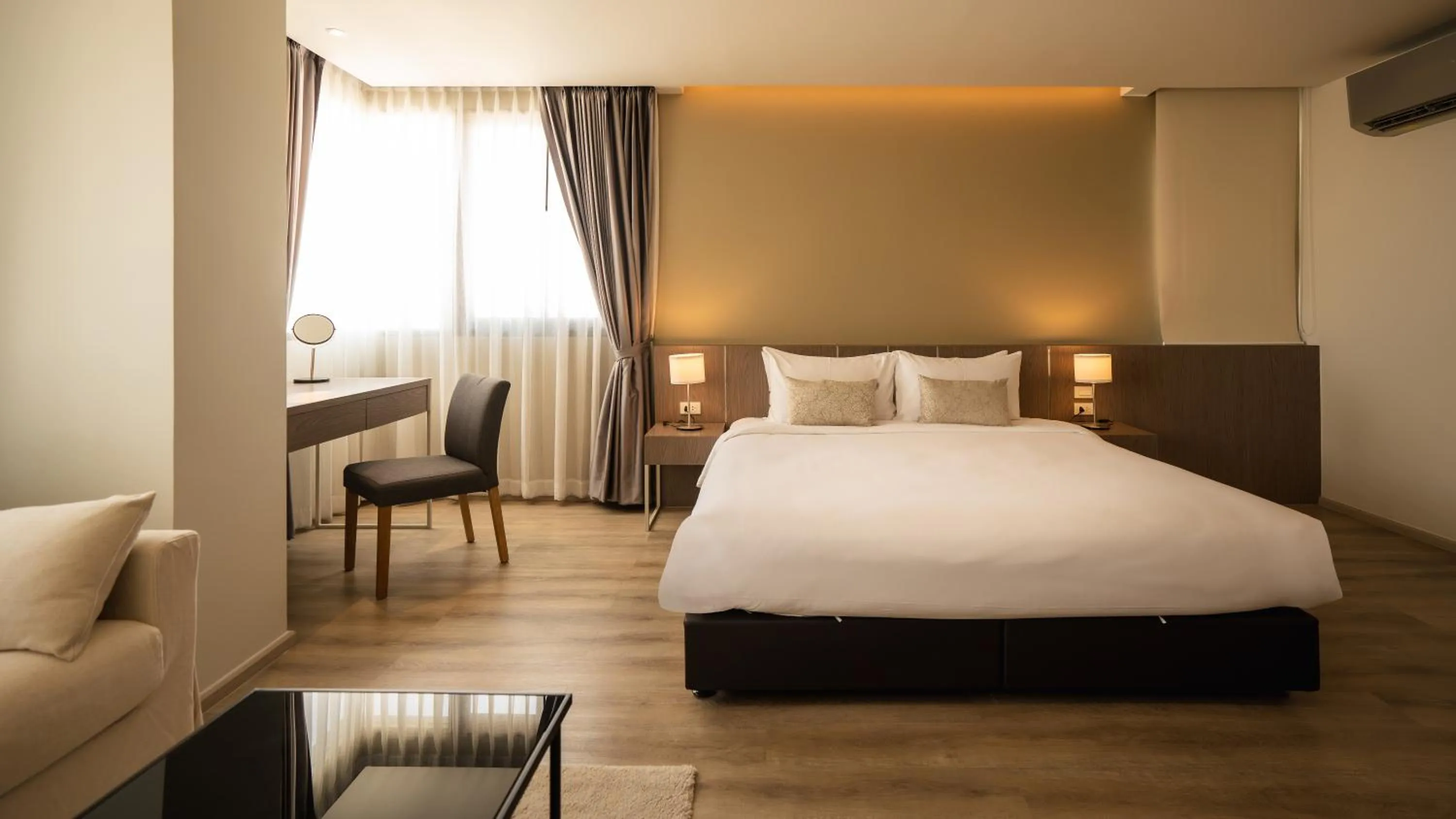 Bed in The Rise Suites Hotel, Chiang Mai - SHA Extra Plus