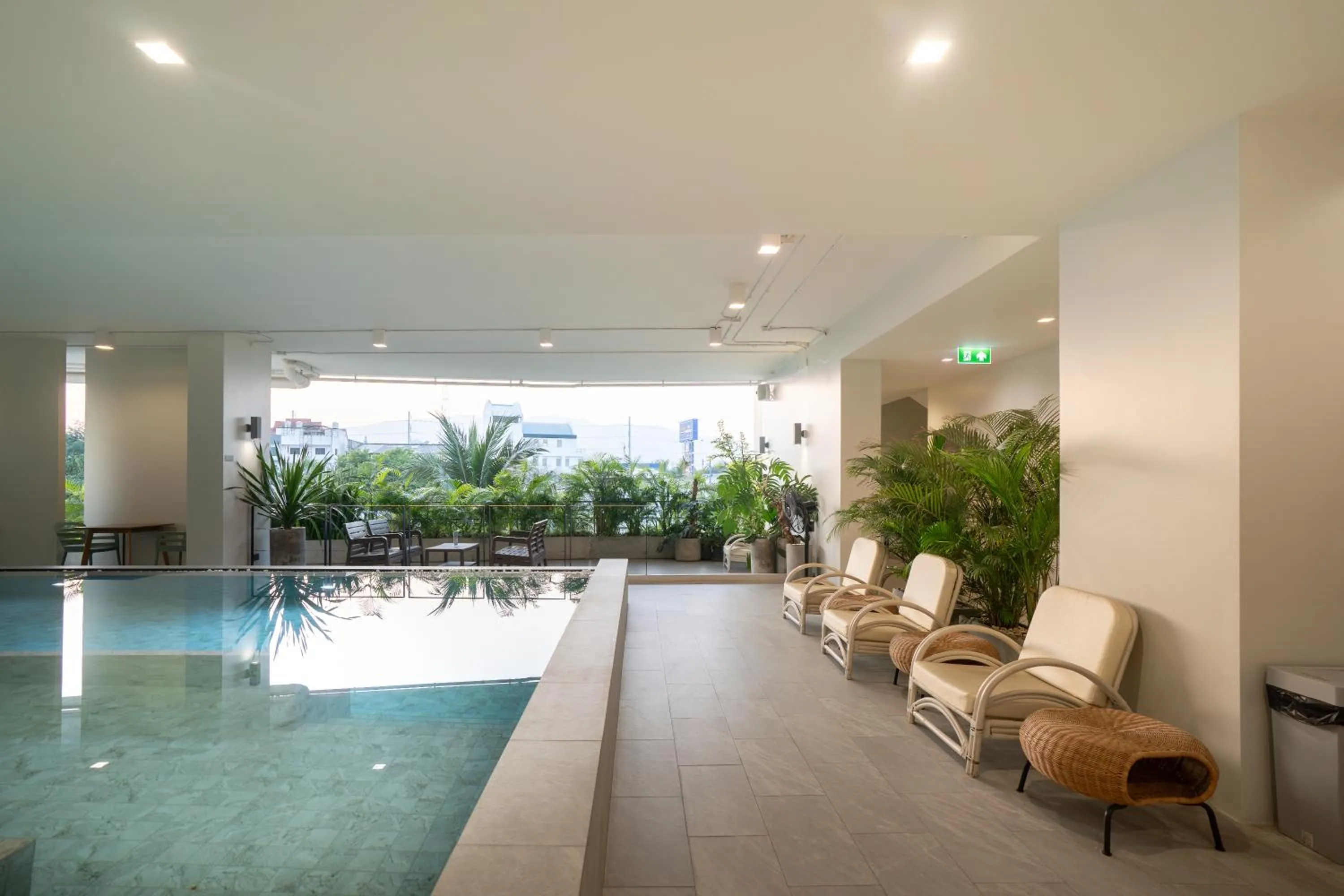 Swimming pool in The Rise Suites Hotel, Chiang Mai - SHA Extra Plus