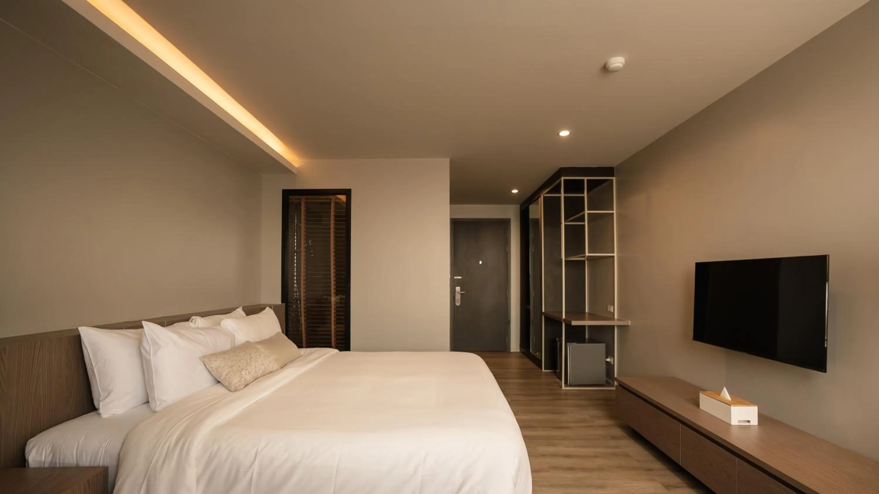 Bedroom, Bed in The Rise Suites Hotel, Chiang Mai - SHA Extra Plus