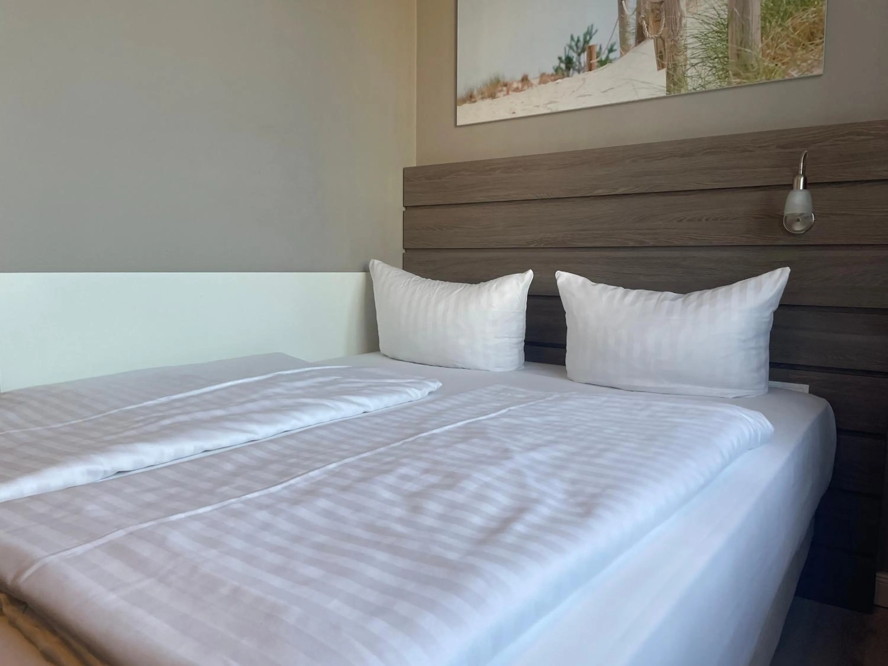 Bed in Hotel Kiel by Golden Tulip