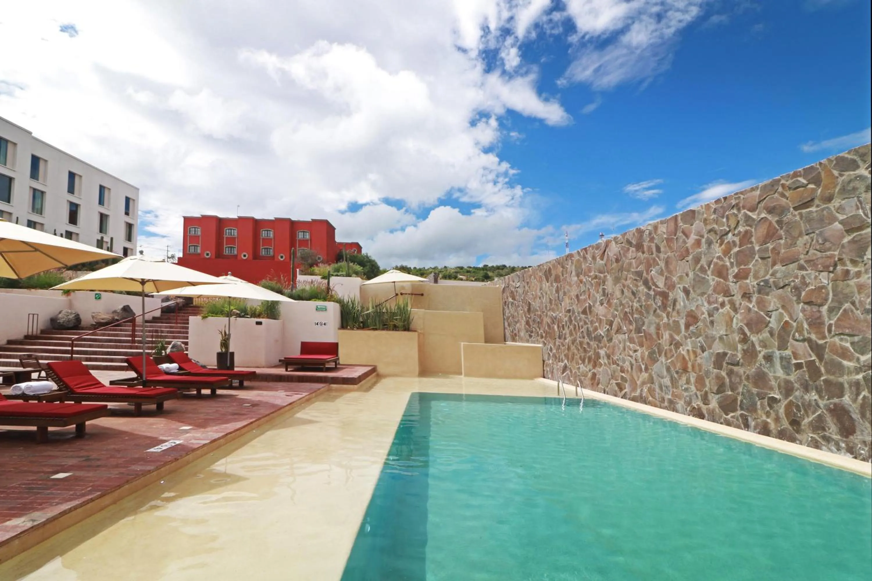 Pool view in Albor San Miguel de Allende, Tapestry Collection by Hilton