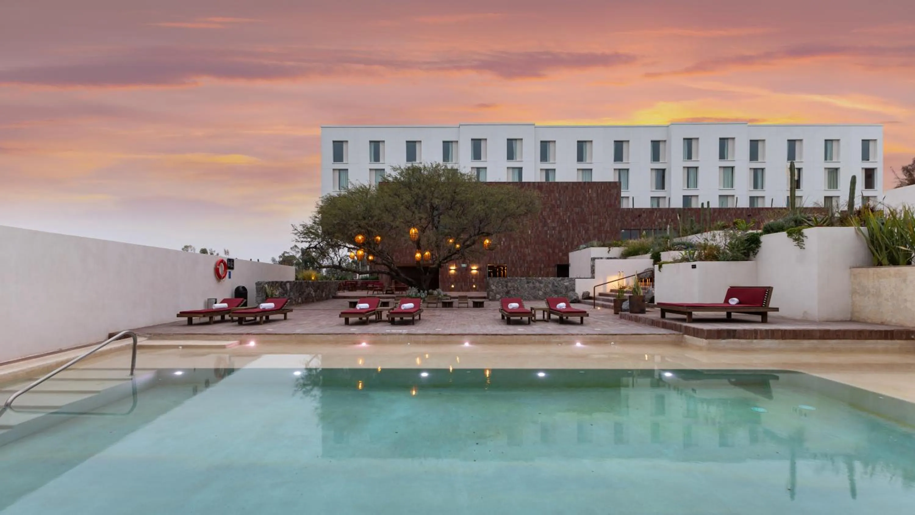 Pool view in Albor San Miguel de Allende, Tapestry Collection by Hilton