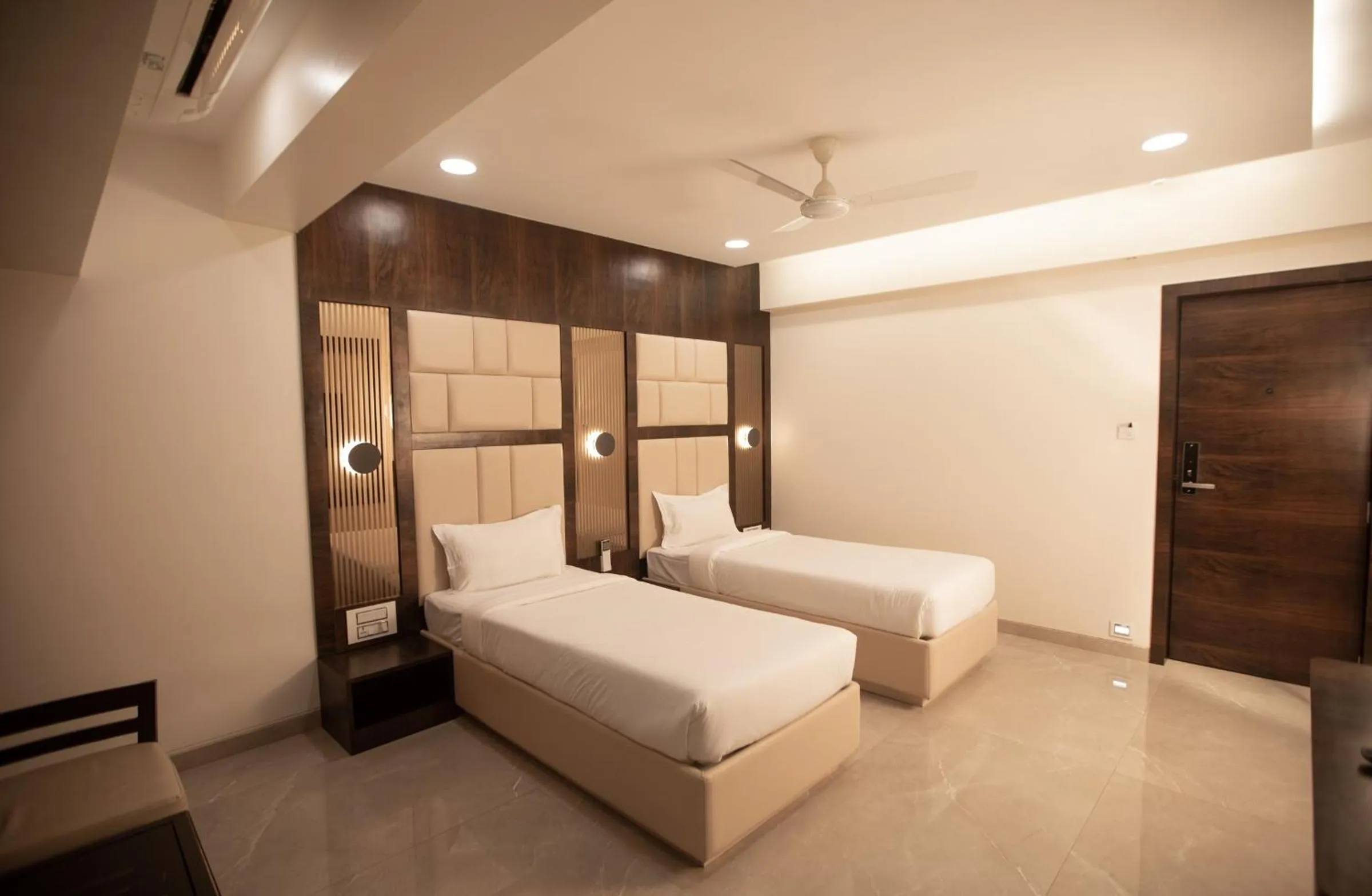 Bed in Hotel Naaz Executive