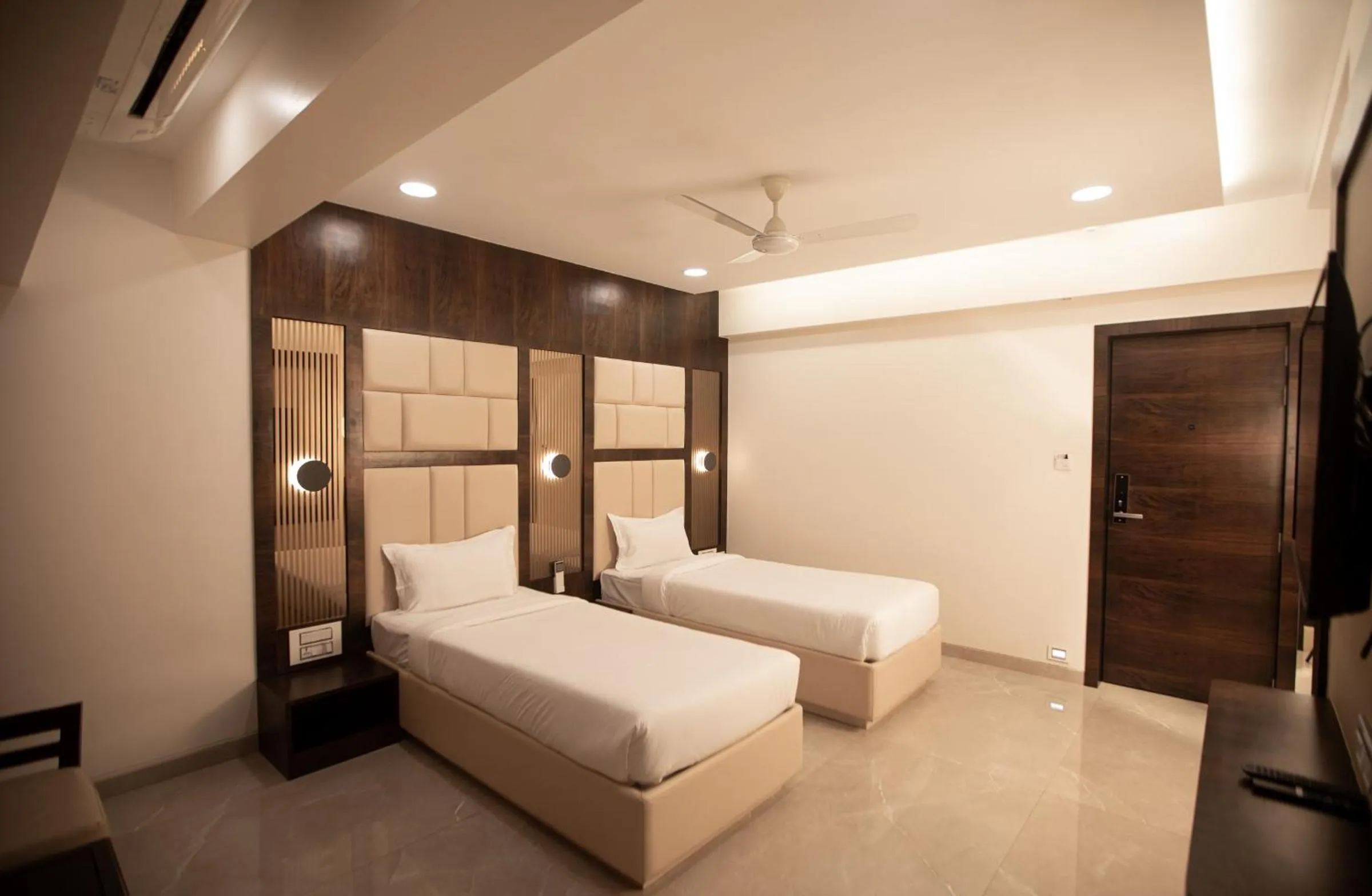 Bed in Hotel Naaz Executive
