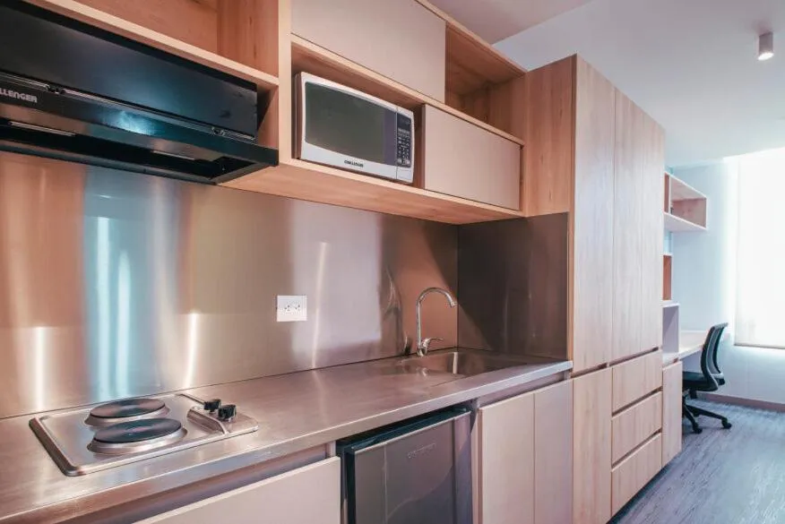 Kitchen or kitchenette in UMA Suites Chia
