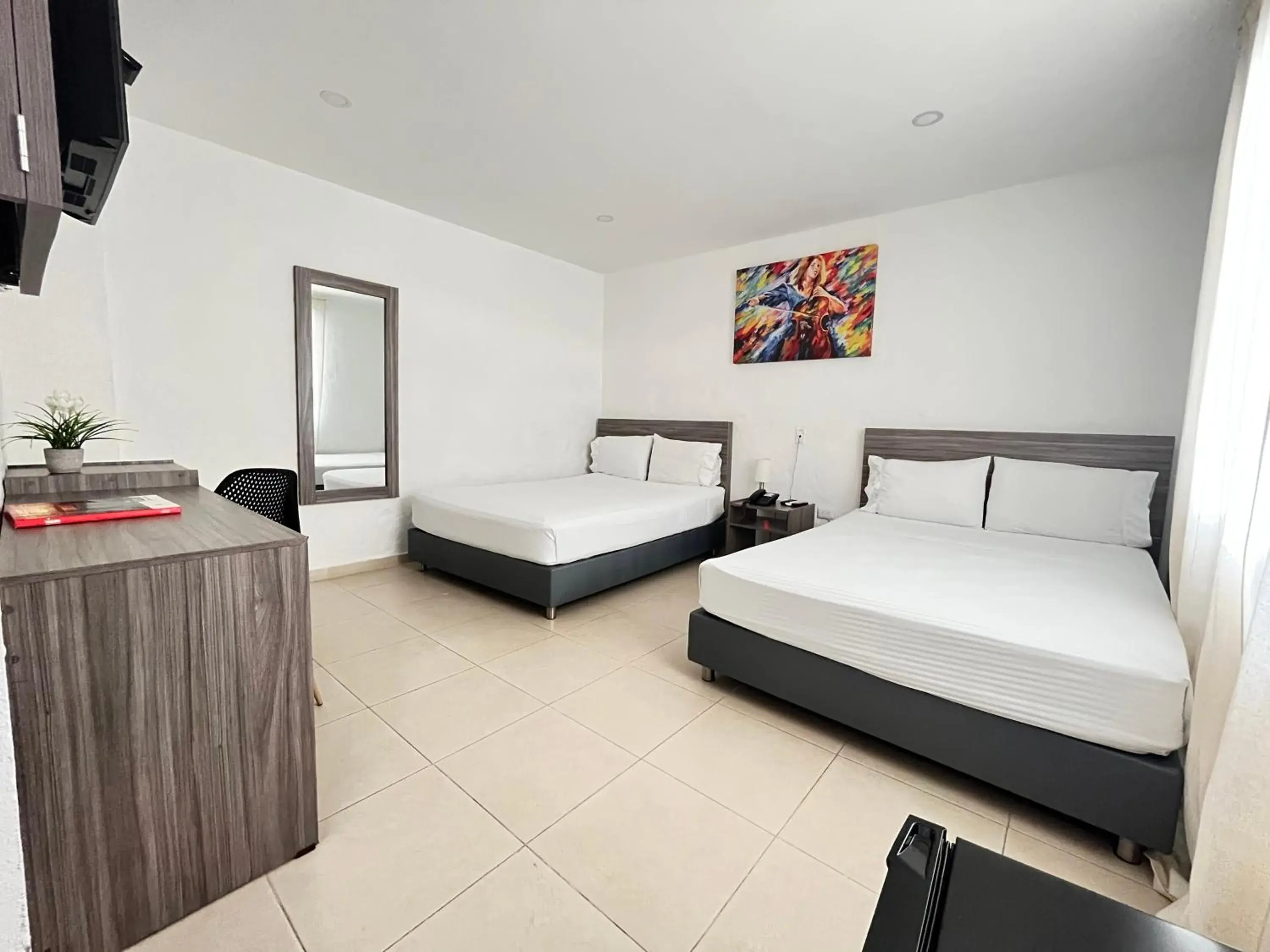 Standard Quadruple Room - single occupancy in Hotel Vanguardia Natural Standard Quadruple Room - single occupancy in Hotel Vanguardia Natural