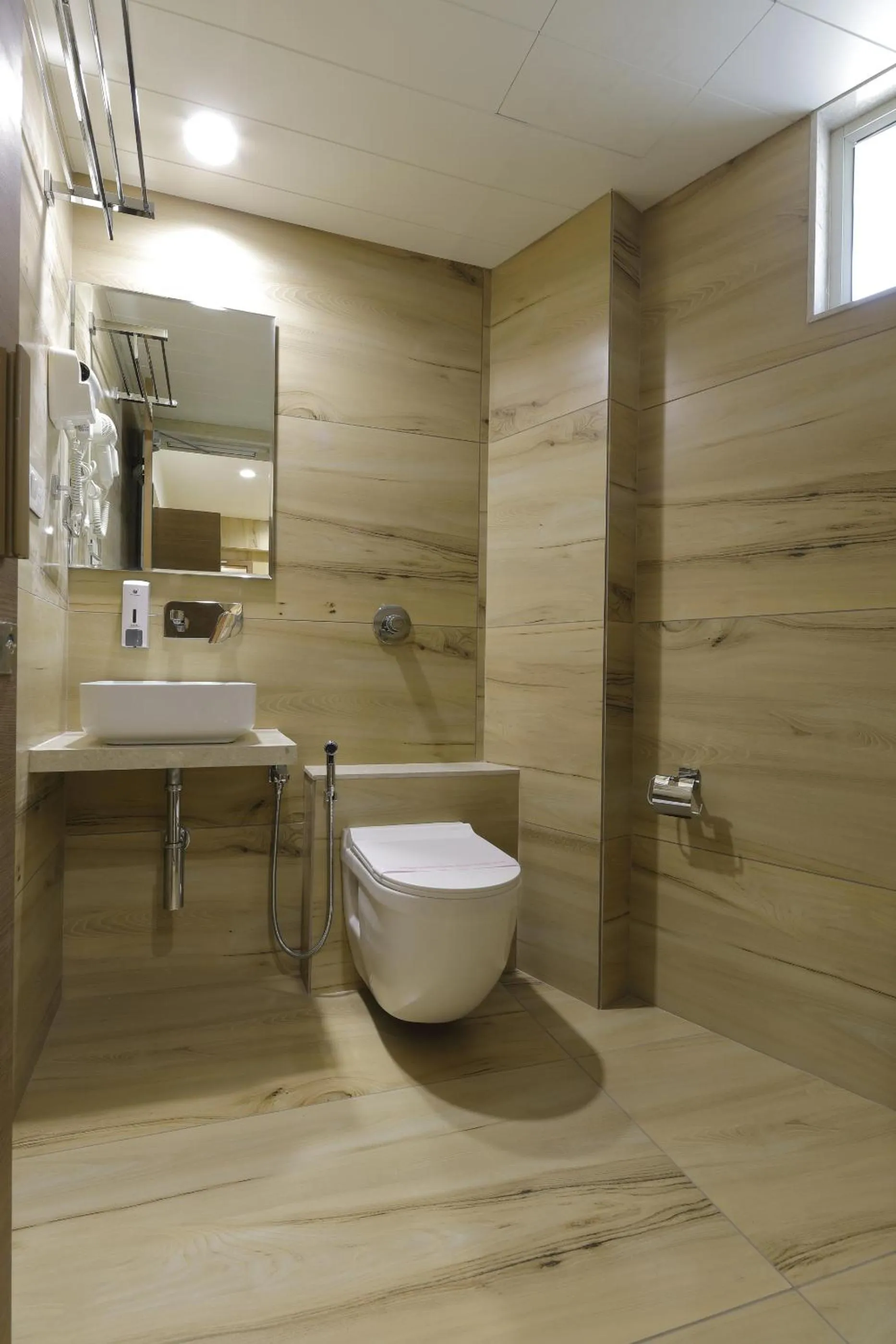 Bathroom in Hotel Elysian Residency