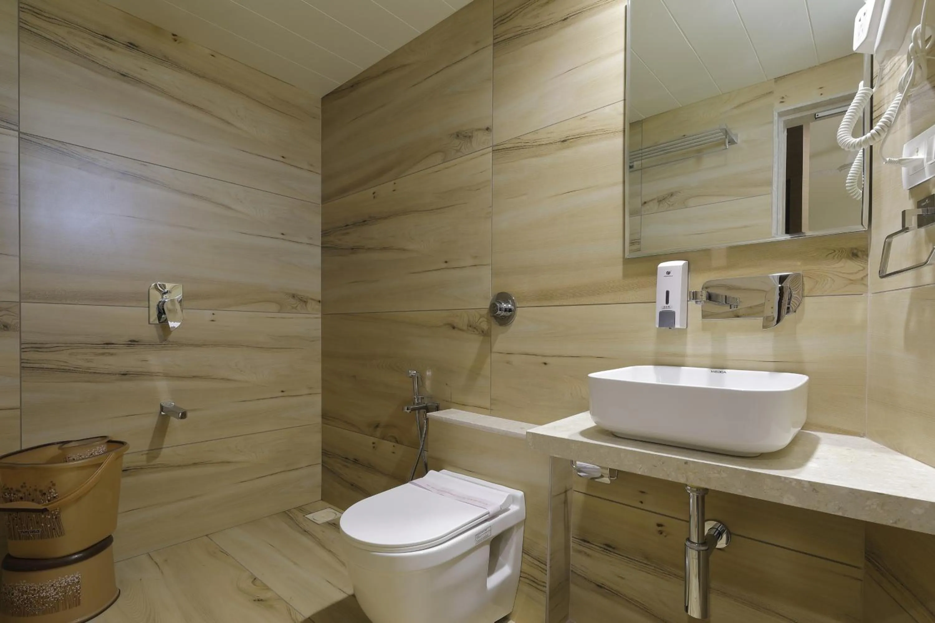 Bathroom in Hotel Elysian Residency