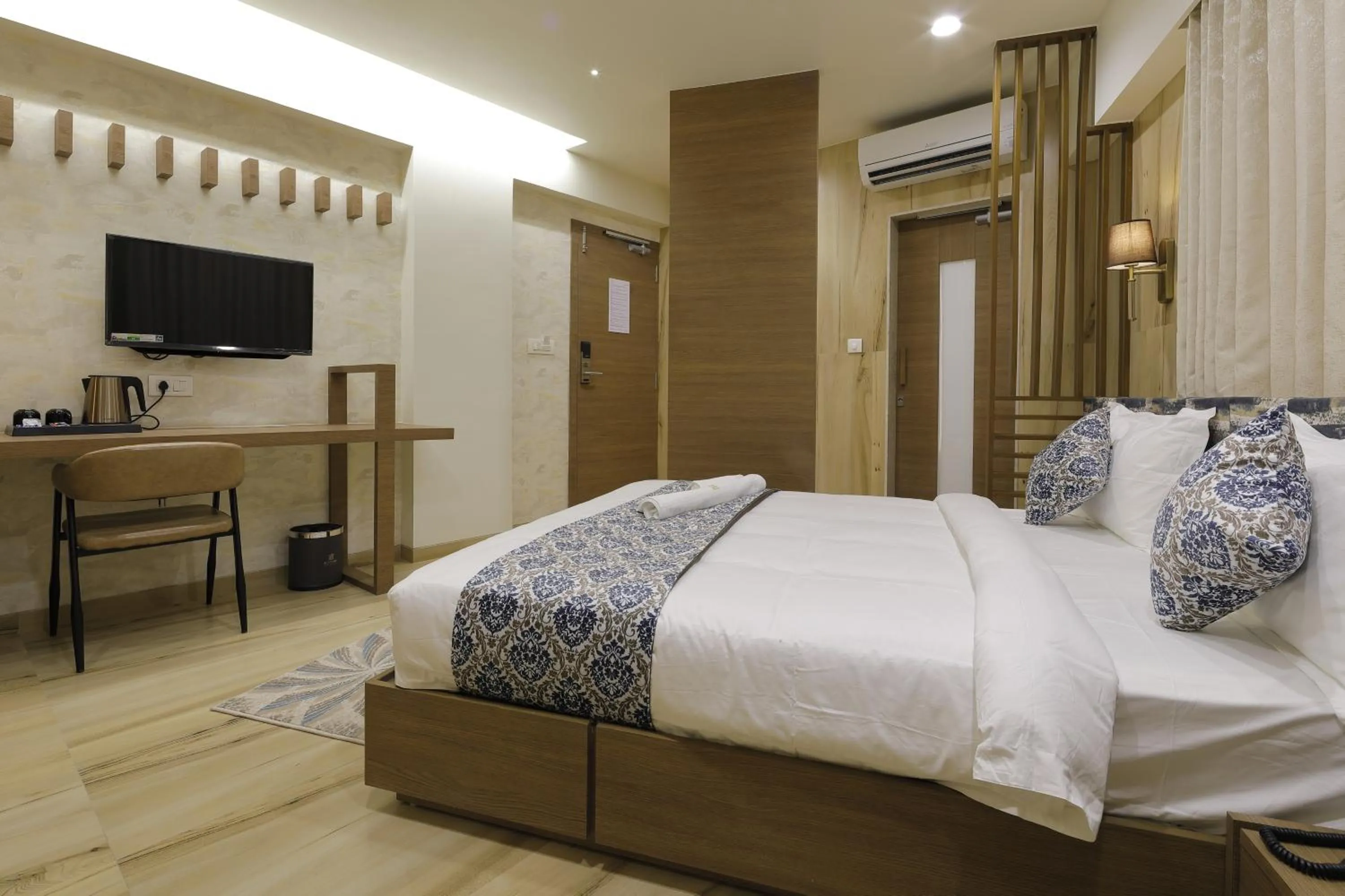 Photo of the whole room, Bed in Hotel Elysian Residency