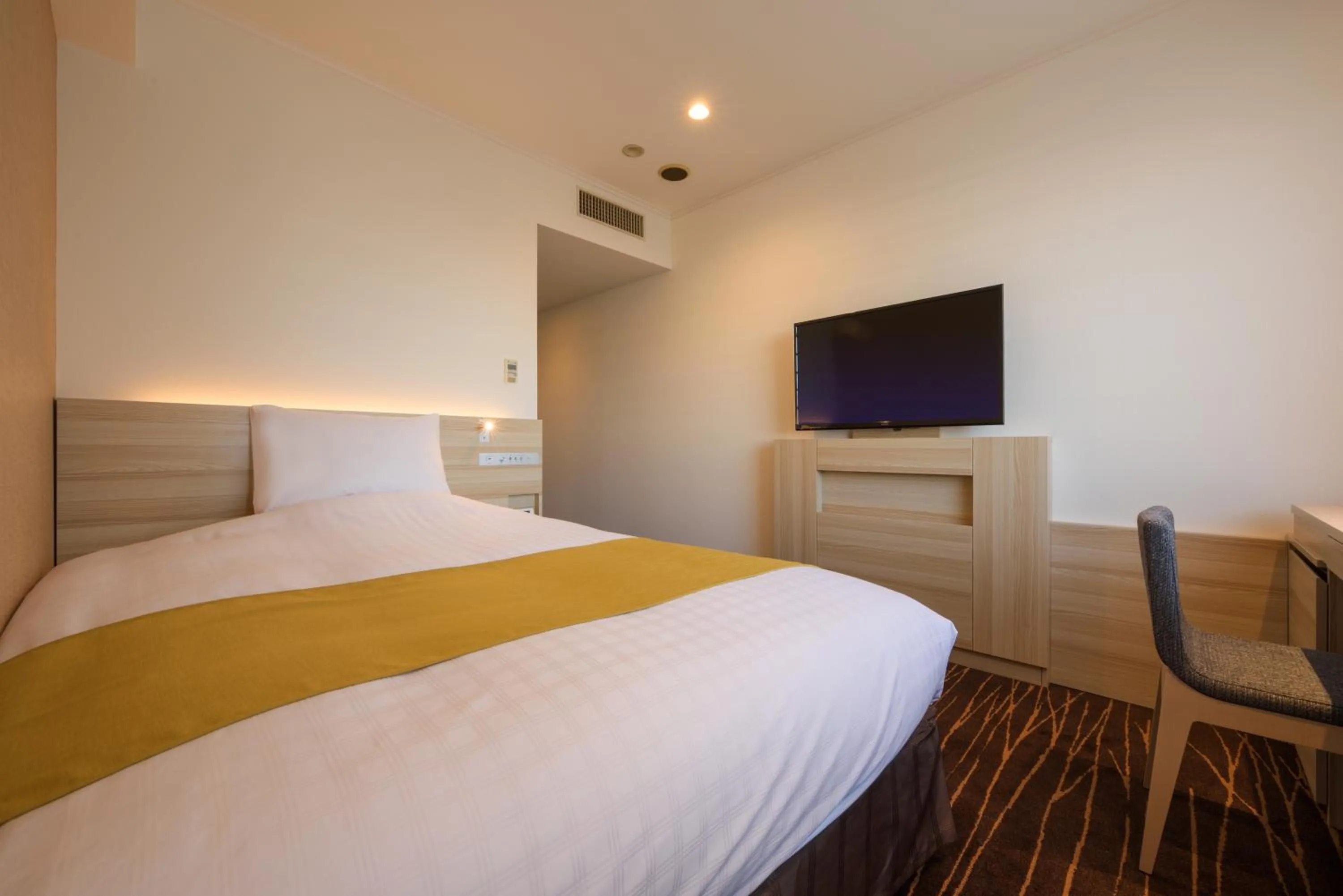 Bed in Hotel JAL City Sendai