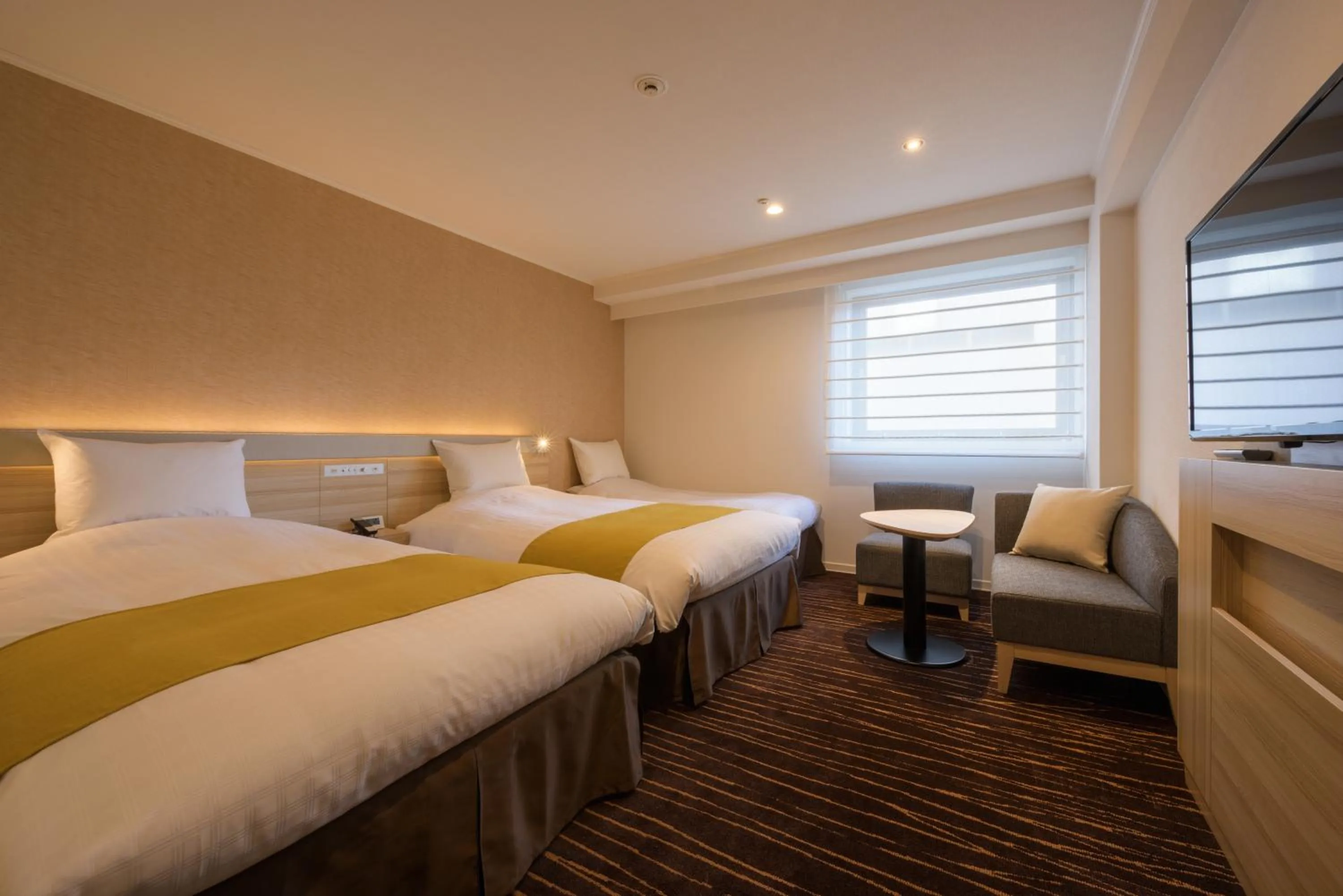 Bed in Hotel JAL City Sendai