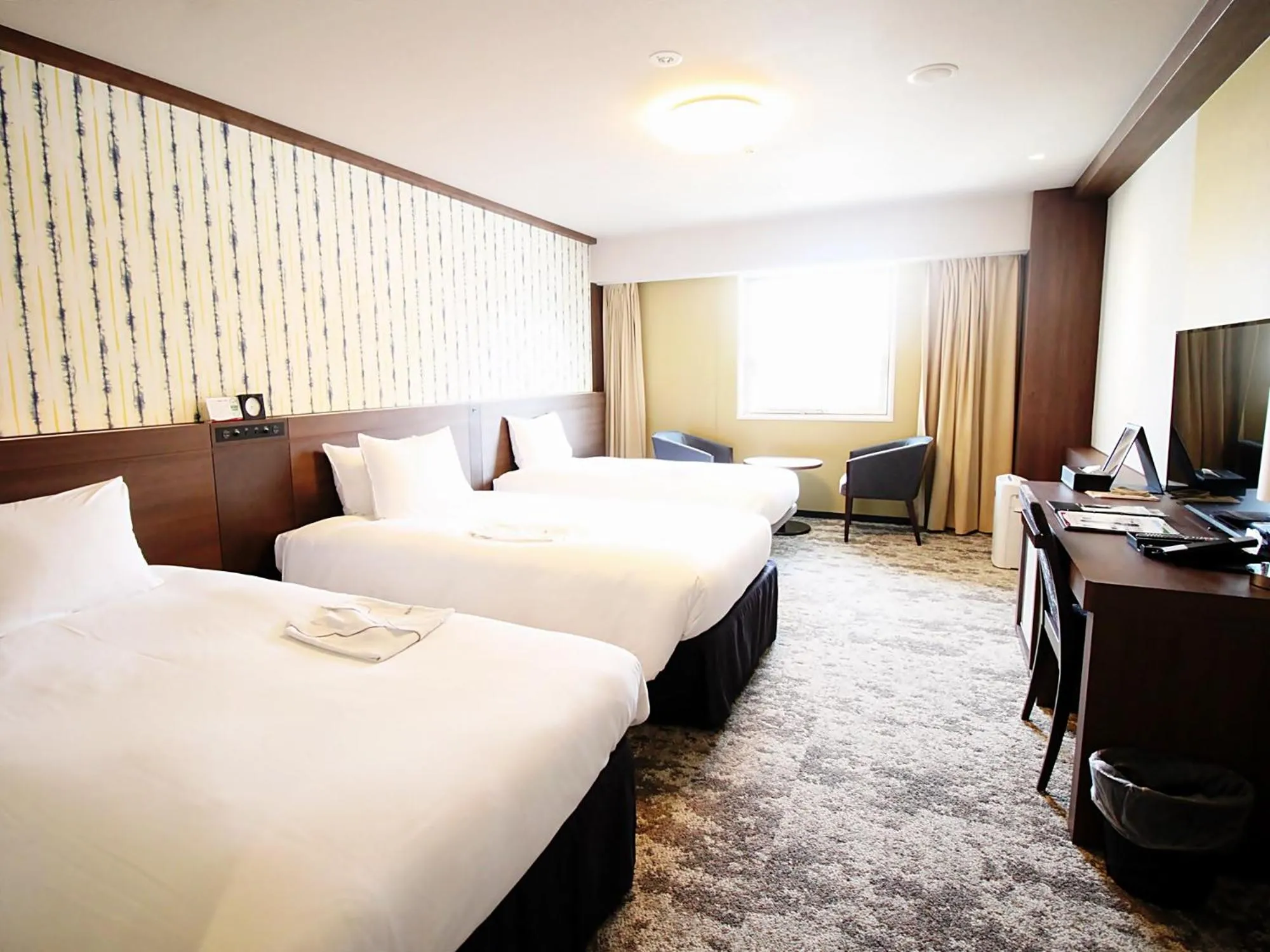 Bed in Richmond Hotel Kochi