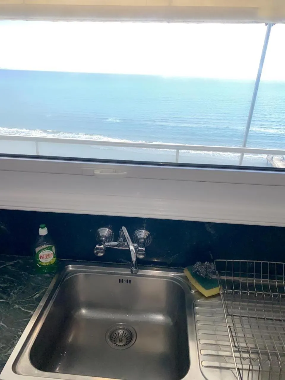 Kitchen or kitchenette in Larnaca Seaview Rooms