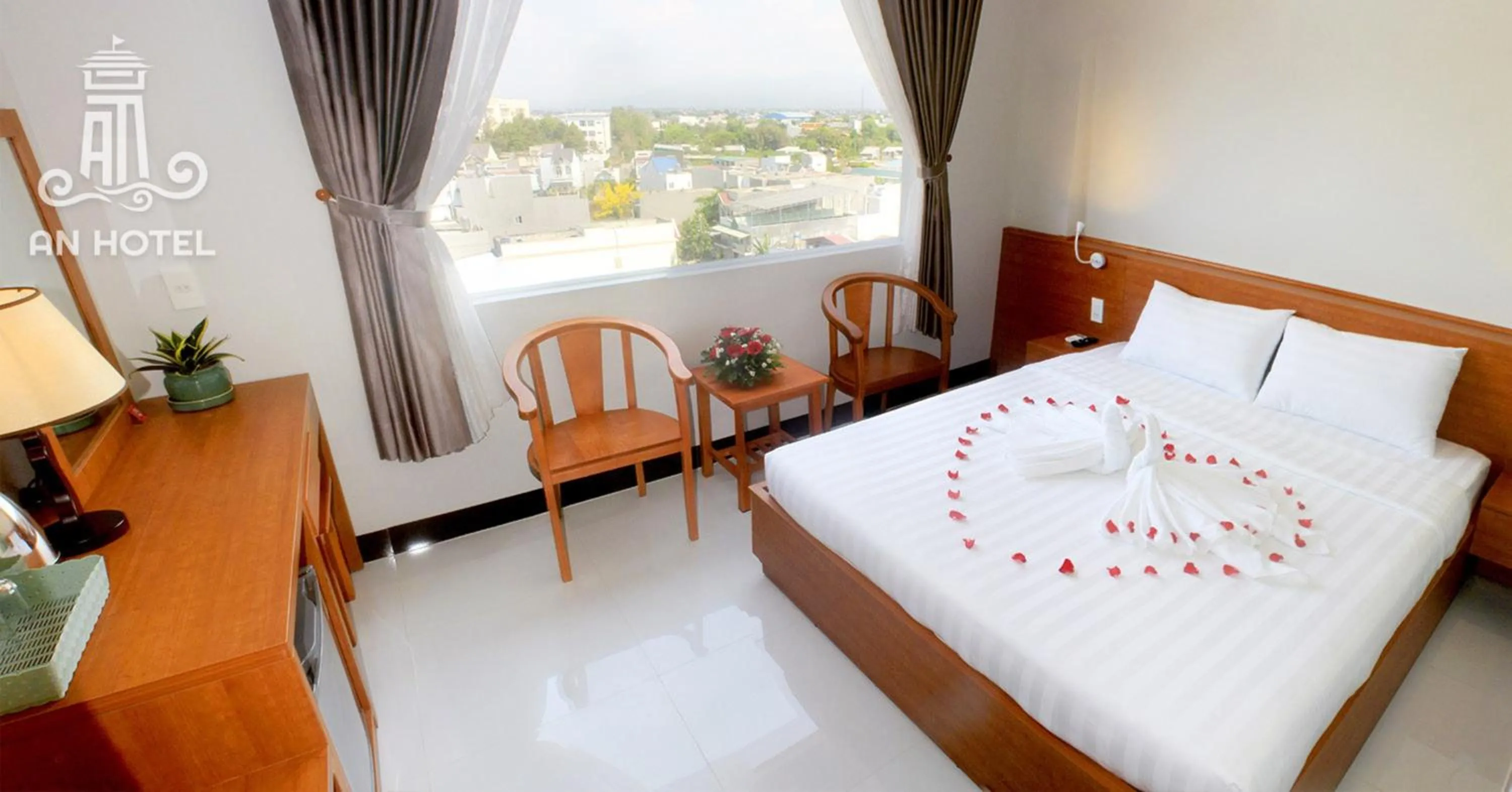 View (from property/room), Bed in An Hotel Phan Thiết