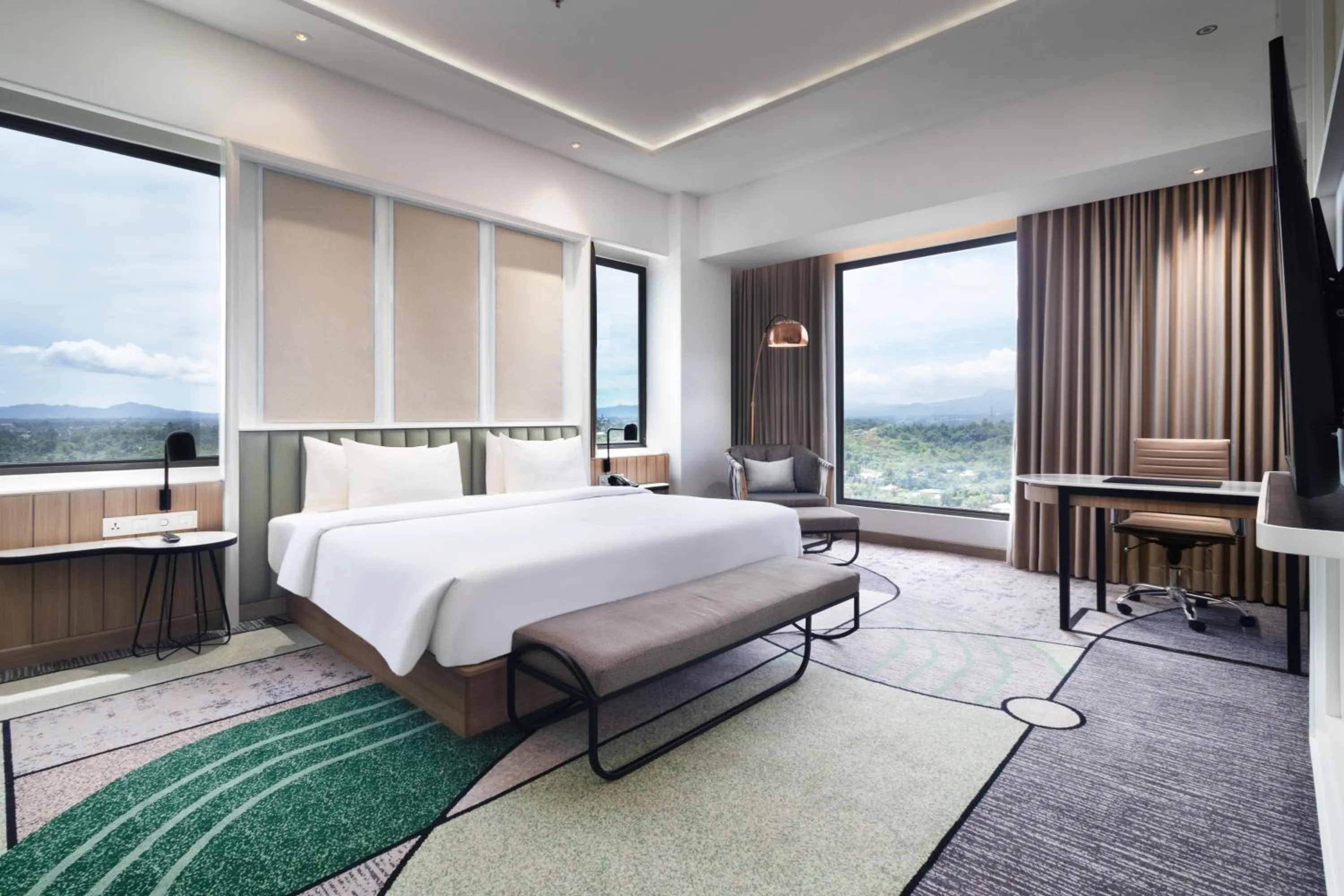 Bed in Luwansa Hotel and Convention Center Manado