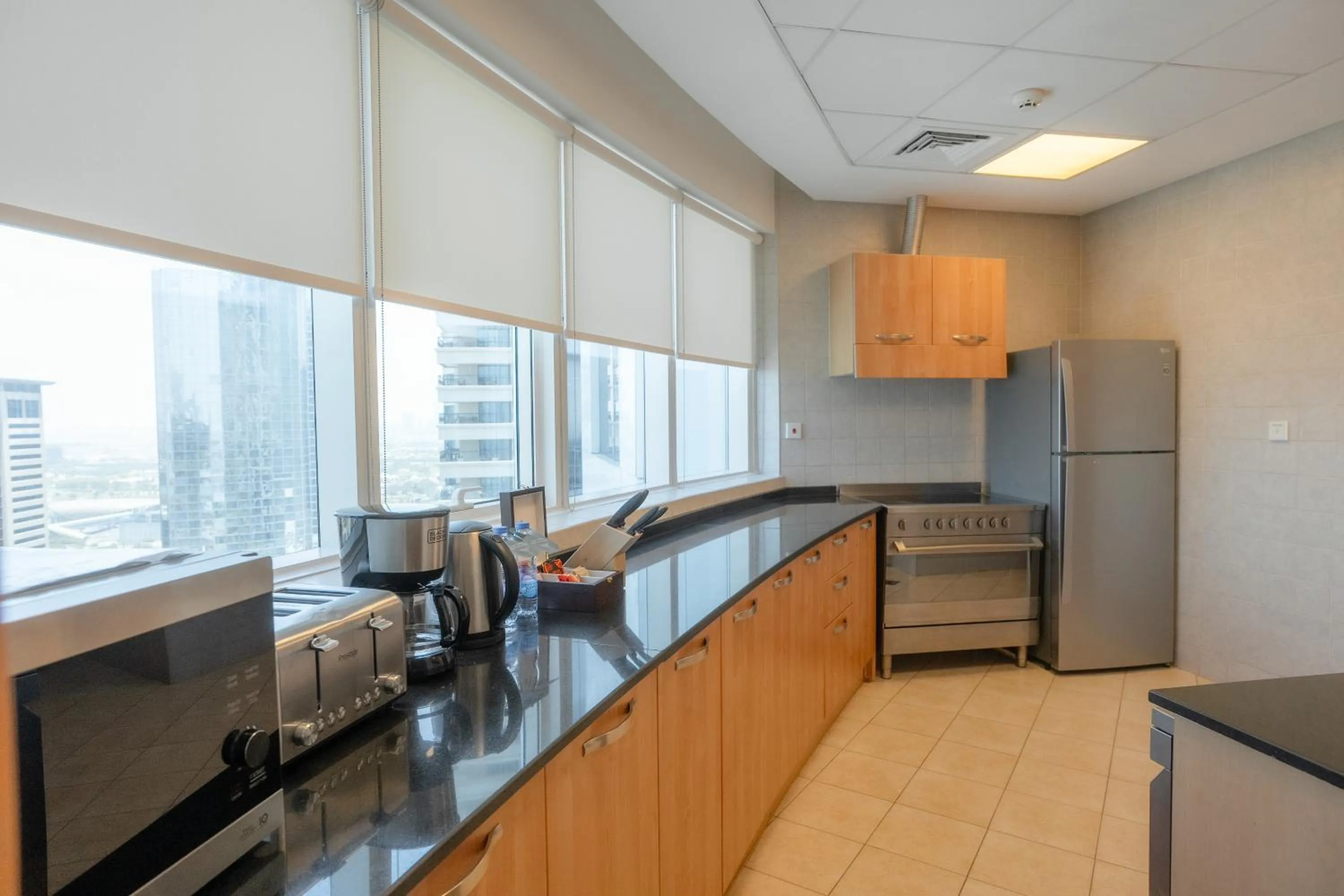 Kitchen or kitchenette in Tamani Marina Hotel & Apartments