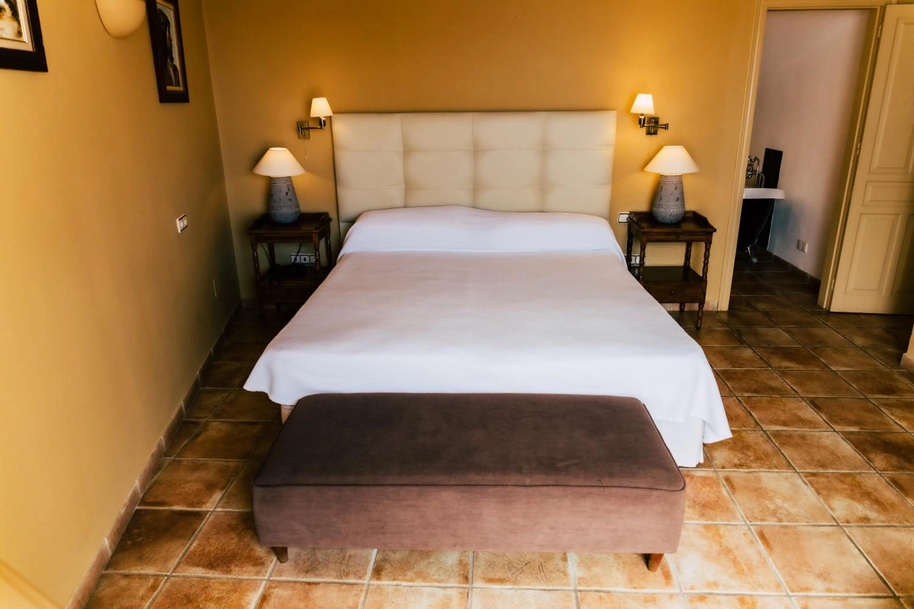 Bed in Hotel Carabeo