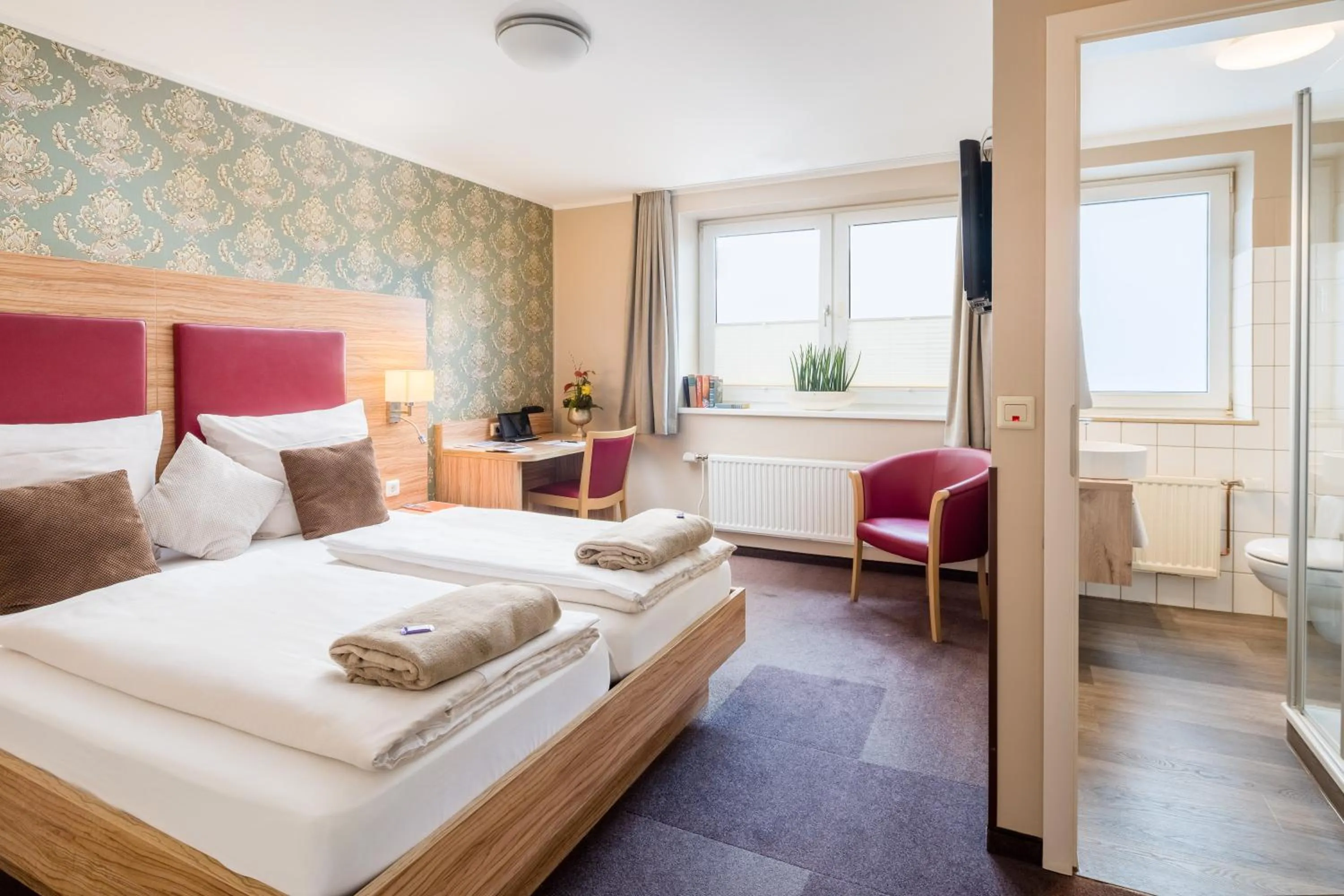 Bed in Hotel Stadtidyll & Dependancen