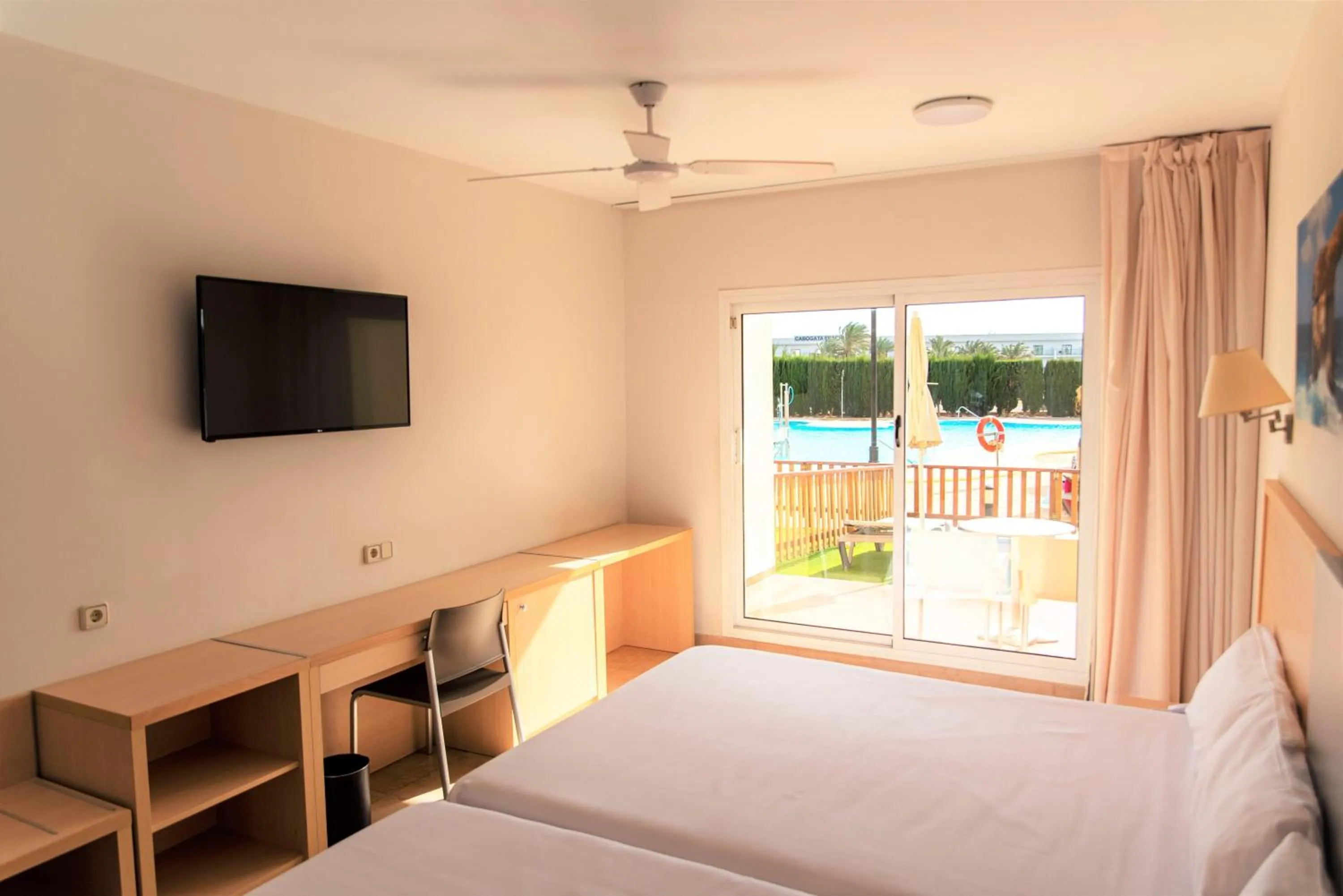 Photo of the whole room, Bed in ALEGRIA Cabo De Gata