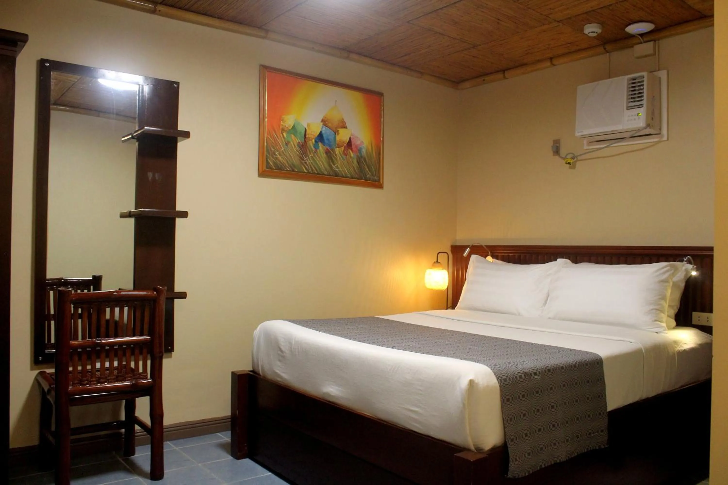 Bed in P&M Final Option Beach Resort