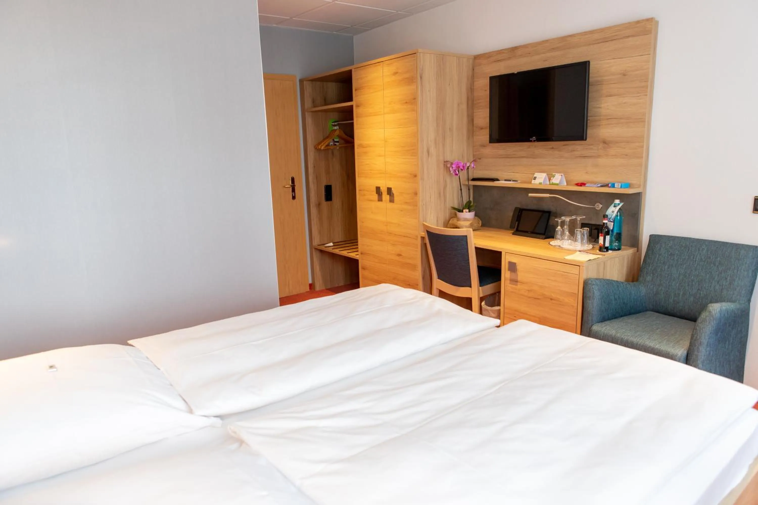 Bed in Flair Hotel Deutsches Haus